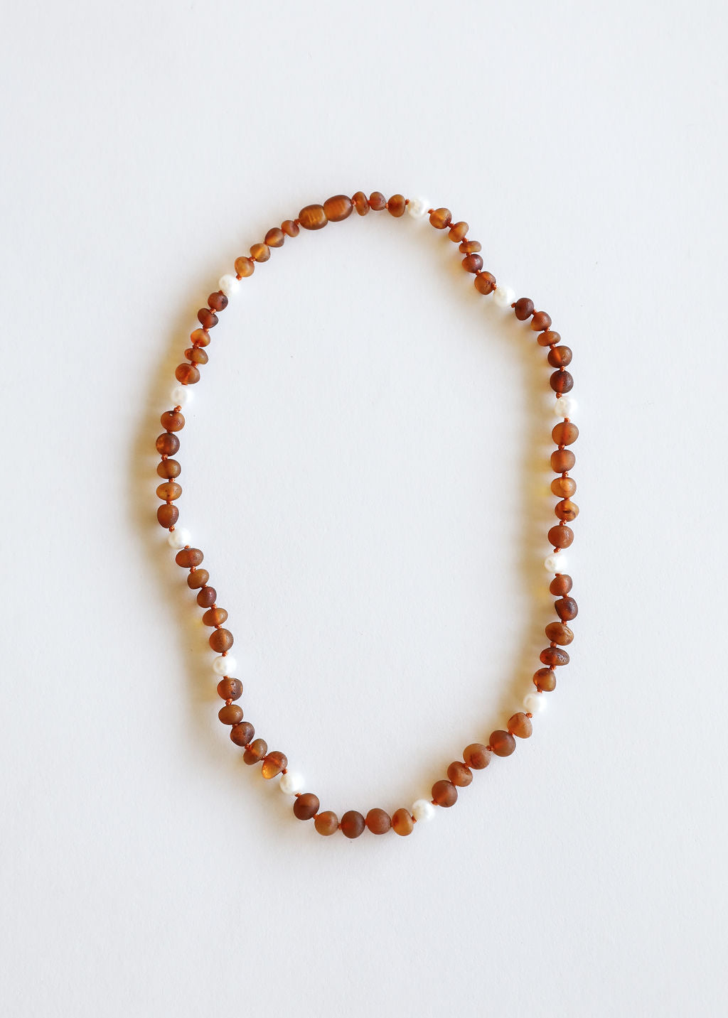 CanyonLeaf Raw Cognac Baltic Amber + Pearl Halo || Necklace — main product shot