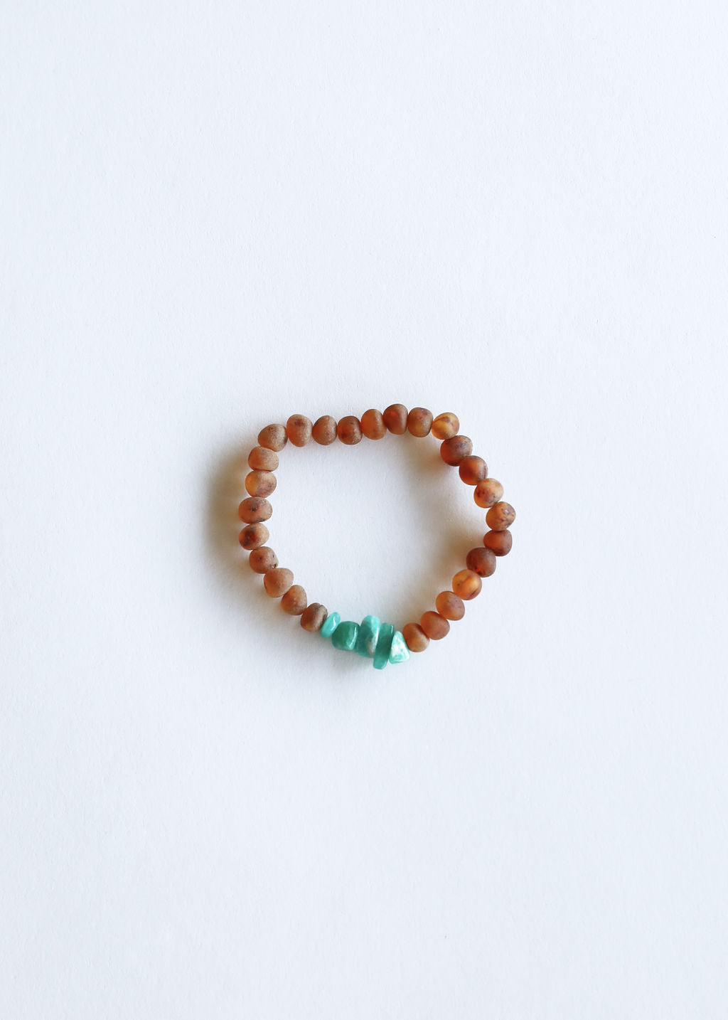 CanyonLeaf Raw Cognac Baltic Amber + Raw Amazonite || Adult Bracelet — CanyonLeaf branding close-up