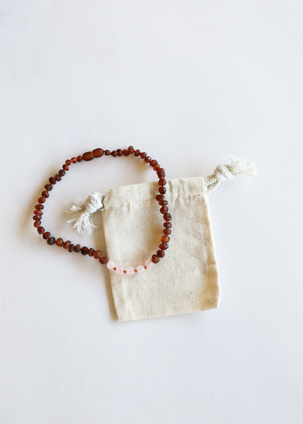 CanyonLeaf Raw Cognac Baltic Amber + Rose Quartz || Necklace — necklace category context