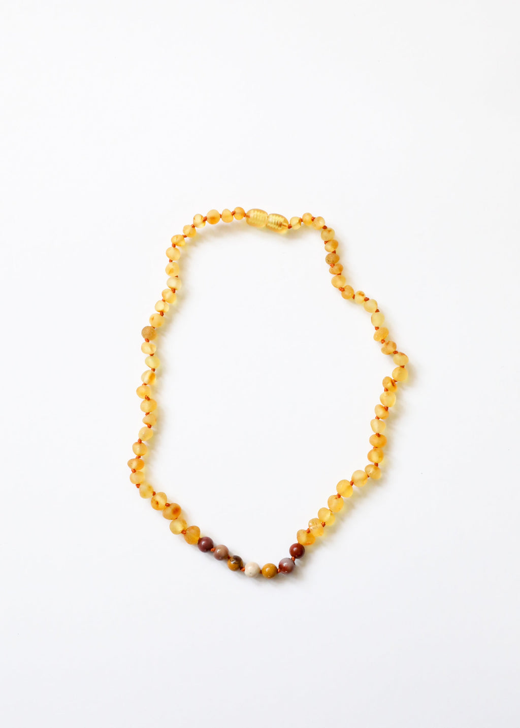 CanyonLeaf Raw Honey Baltic Amber + Mookaite Jasper || Necklace — CanyonLeaf branding close-up