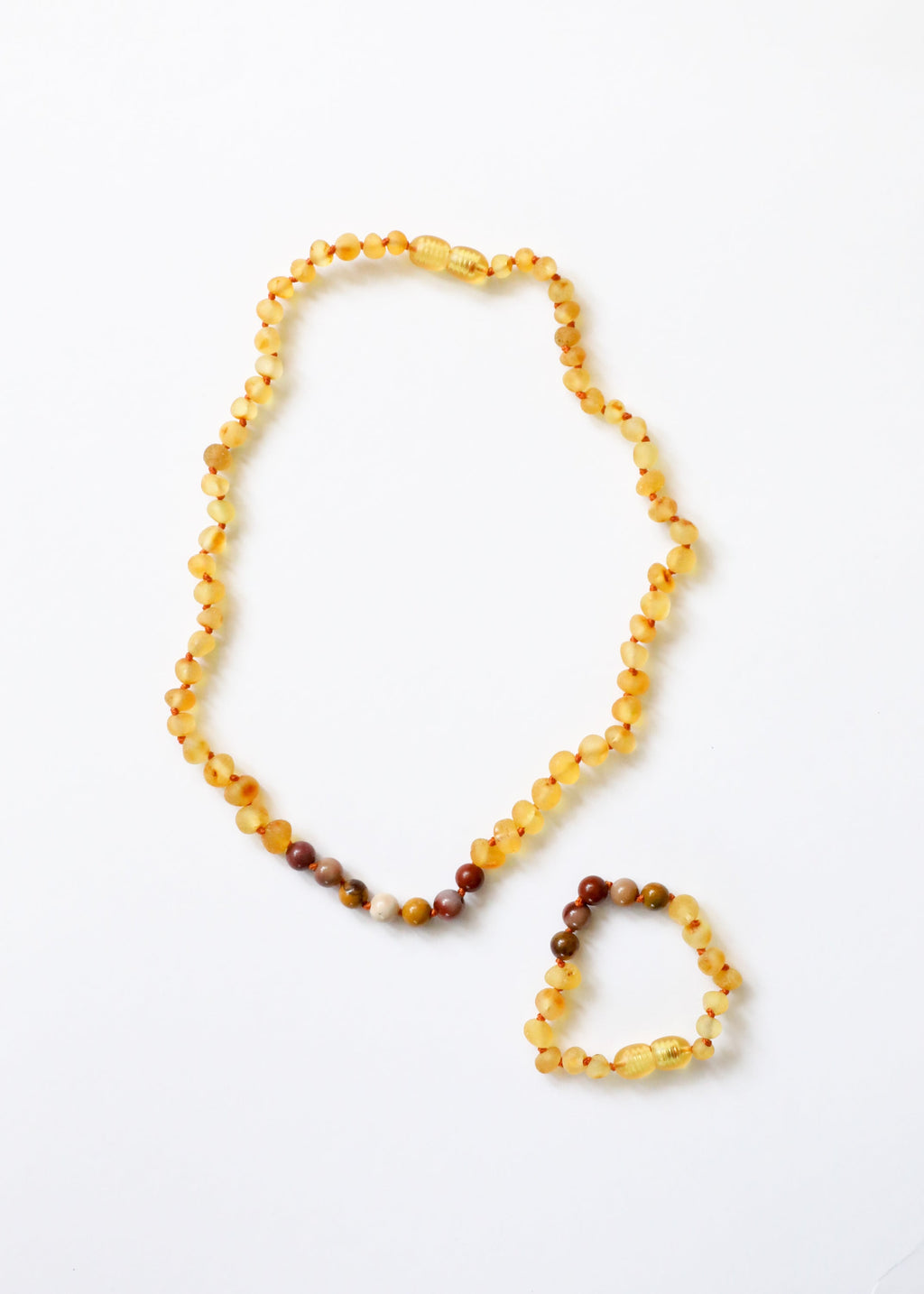CanyonLeaf Raw Honey Baltic Amber + Mookaite Jasper || Necklace — lifestyle worn / used context