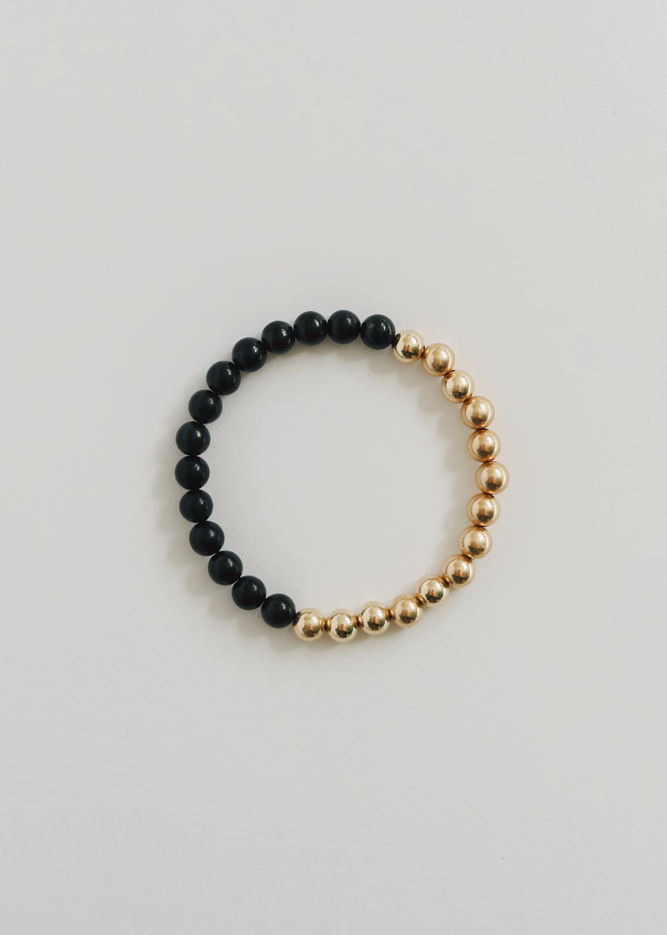 CanyonLeaf Shungite : 14k Gold Filled Sun + Moon || Stretch Bracelets — CanyonLeaf branding close-up