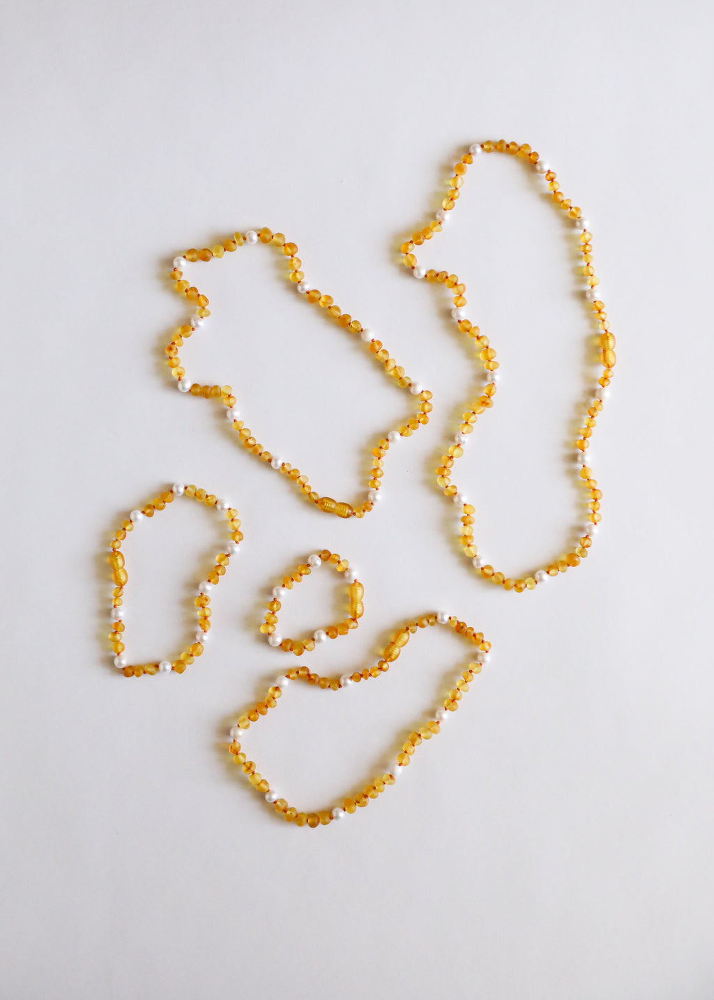 CanyonLeaf Raw Honey Baltic Amber + Pearl Halo || Necklace — lifestyle worn / used context