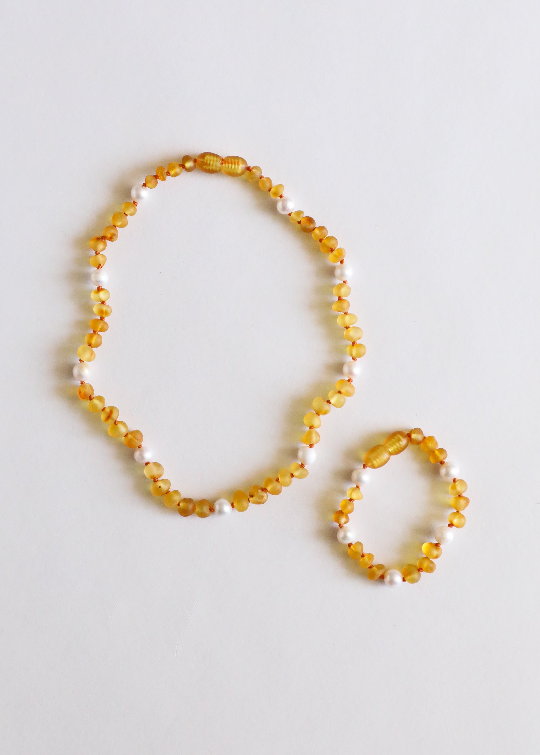 CanyonLeaf Raw Honey Baltic Amber + Pearl Halo || Necklace — necklace category context