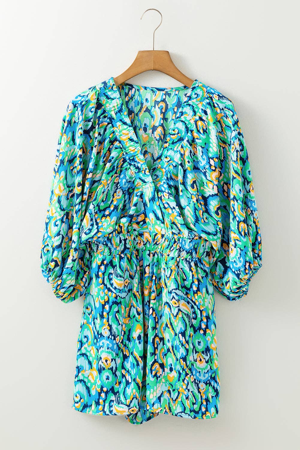 Pretty Little Patriot Pretty Little Patriot Blue & Green Malibu Romper — Pretty Little Patriot branding close-up