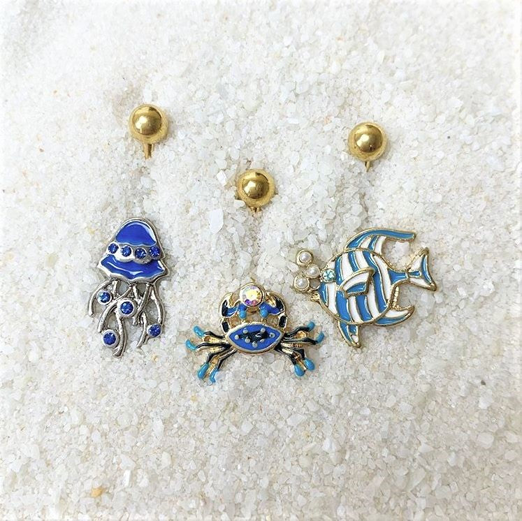 BodyCandy Blue Gem White Orb Gold PVD Fashionable Fishy Belly Ring — detail close-up