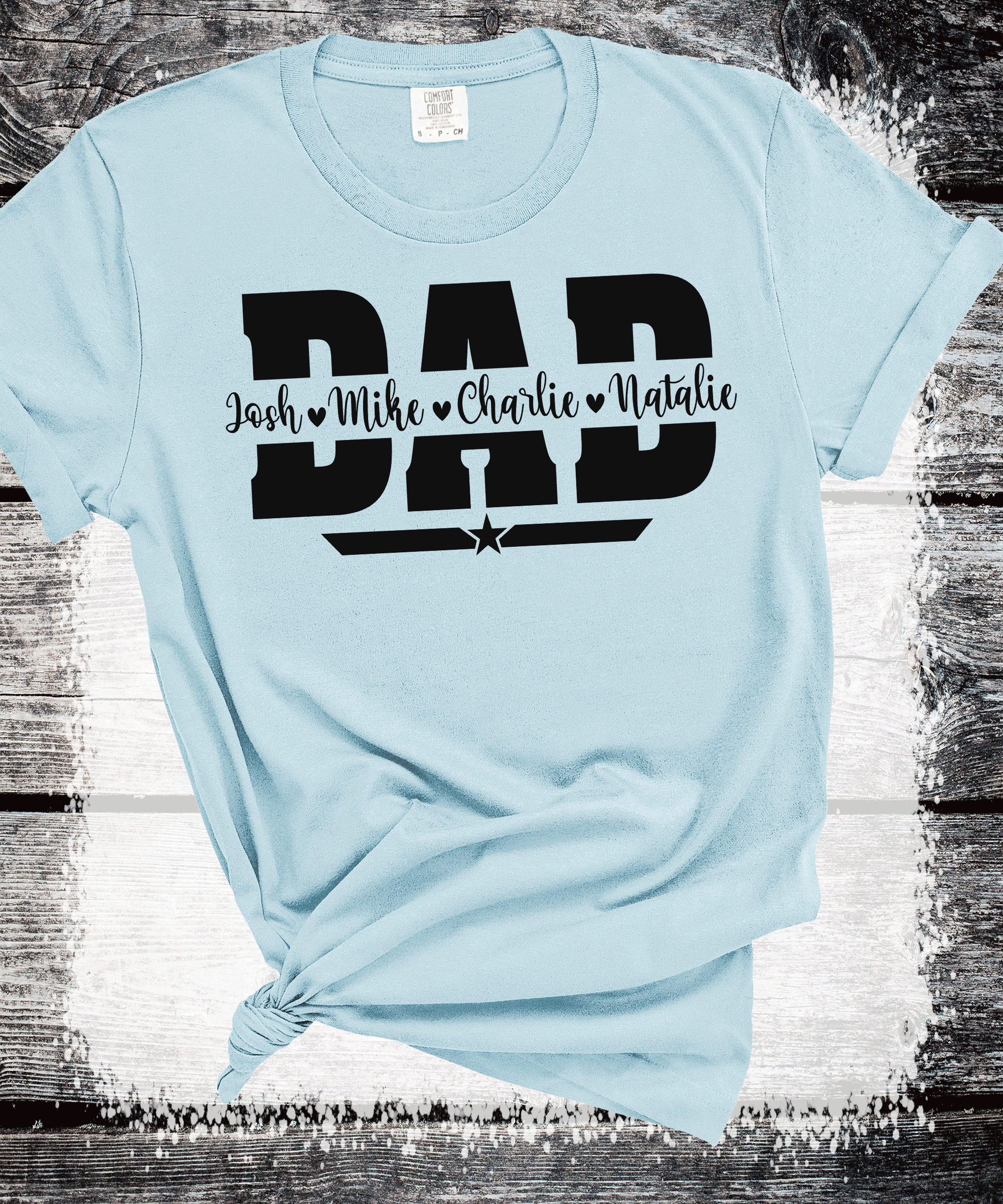 A Blessed Texas Mess Boutique Comfort Colors®  Custom Dad Shirt with Kid Names, Father's Day Gift, New Dad… — A Blessed Texas Mess Boutique branding close-up
