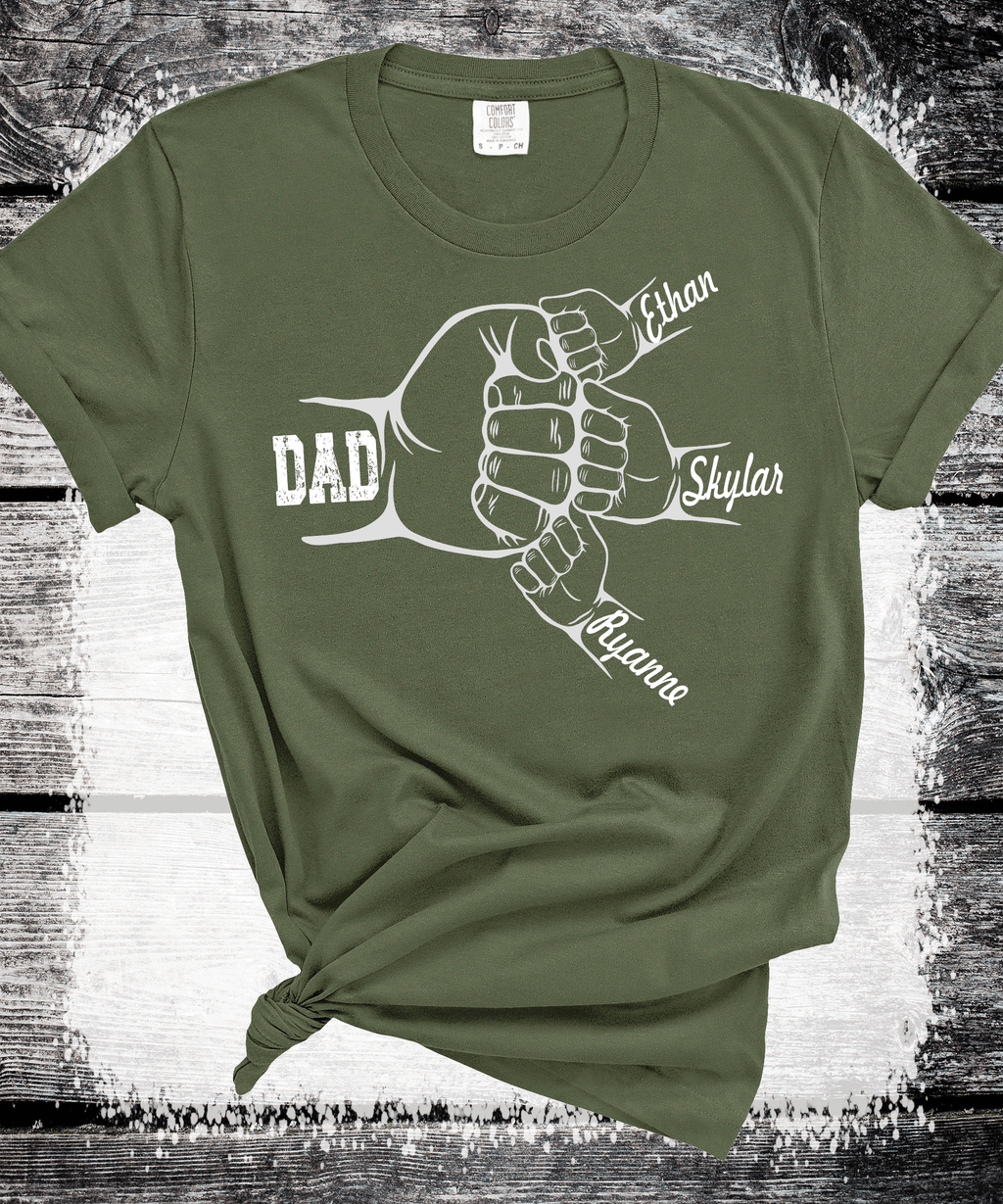 A Blessed Texas Mess Boutique Comfort Colors®  Custom Dad Shirt with Kid Names, Father's Day Gift, New Dad… — A Blessed Texas Mess Boutique branding close-up
