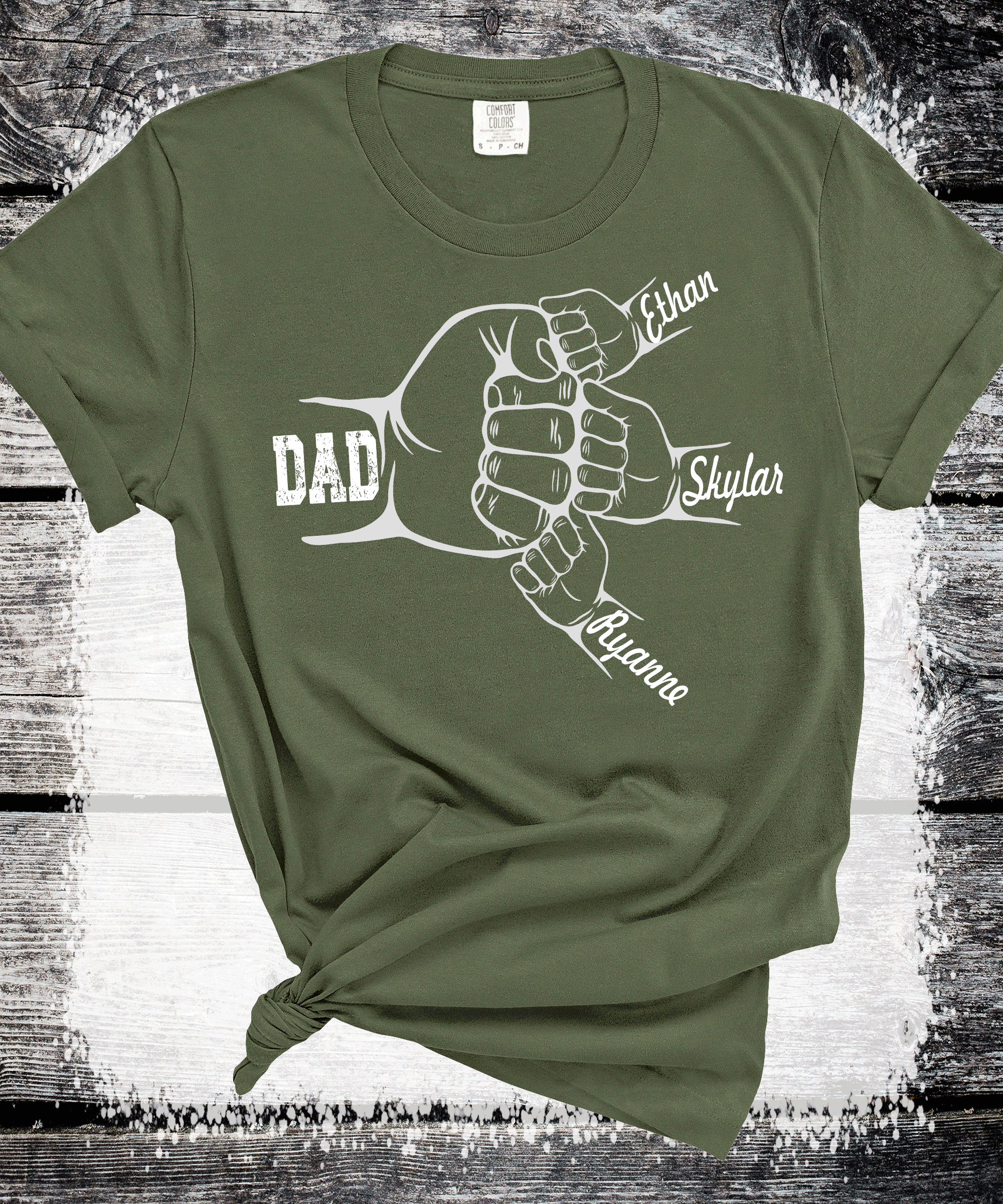 A Blessed Texas Mess Boutique Comfort Colors®  Custom Dad Shirt with Kid Names, Father's Day Gift, New Dad… — A Blessed Texas Mess Boutique branding close-up
