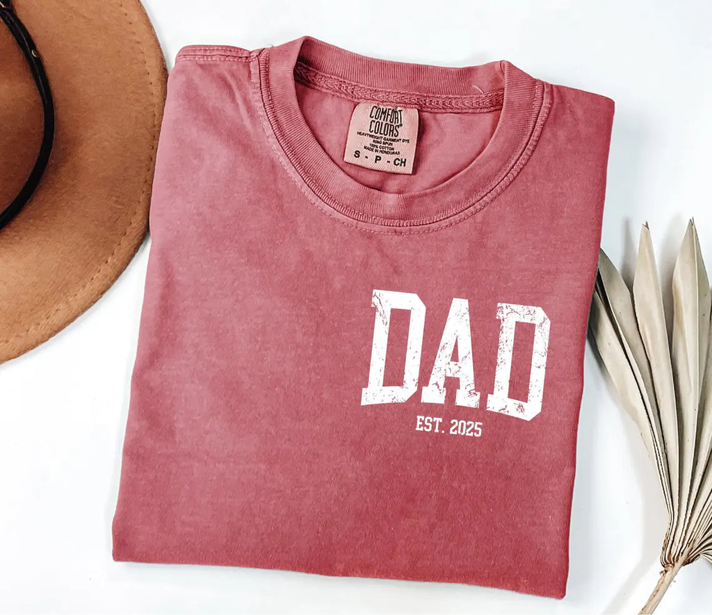 A Blessed Texas Mess Boutique Comfort Colors®  Custom New Dad Shirt EST year Father's Day Daddy Pocket… — A Blessed Texas Mess Boutique branding close-up