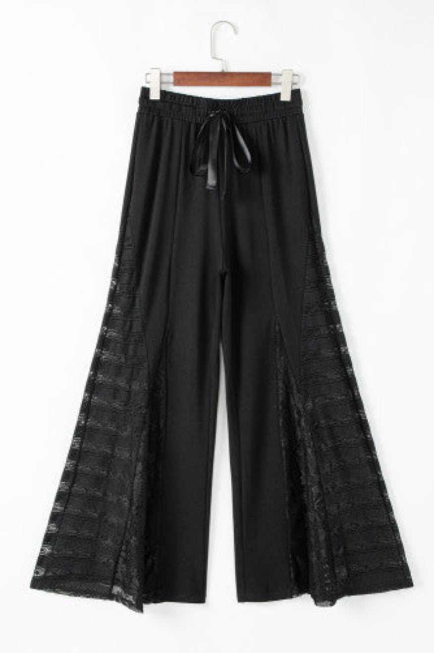 Pretty Little Patriot Pretty Little Patriot Wide Leg Black Lace Pants — Pretty Little Patriot branding close-up