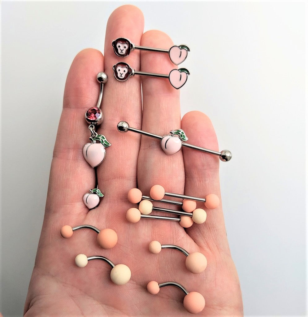 BodyCandy Peaches and Cream Matte Barbell Tongue Ring Set of 4 — detail close-up