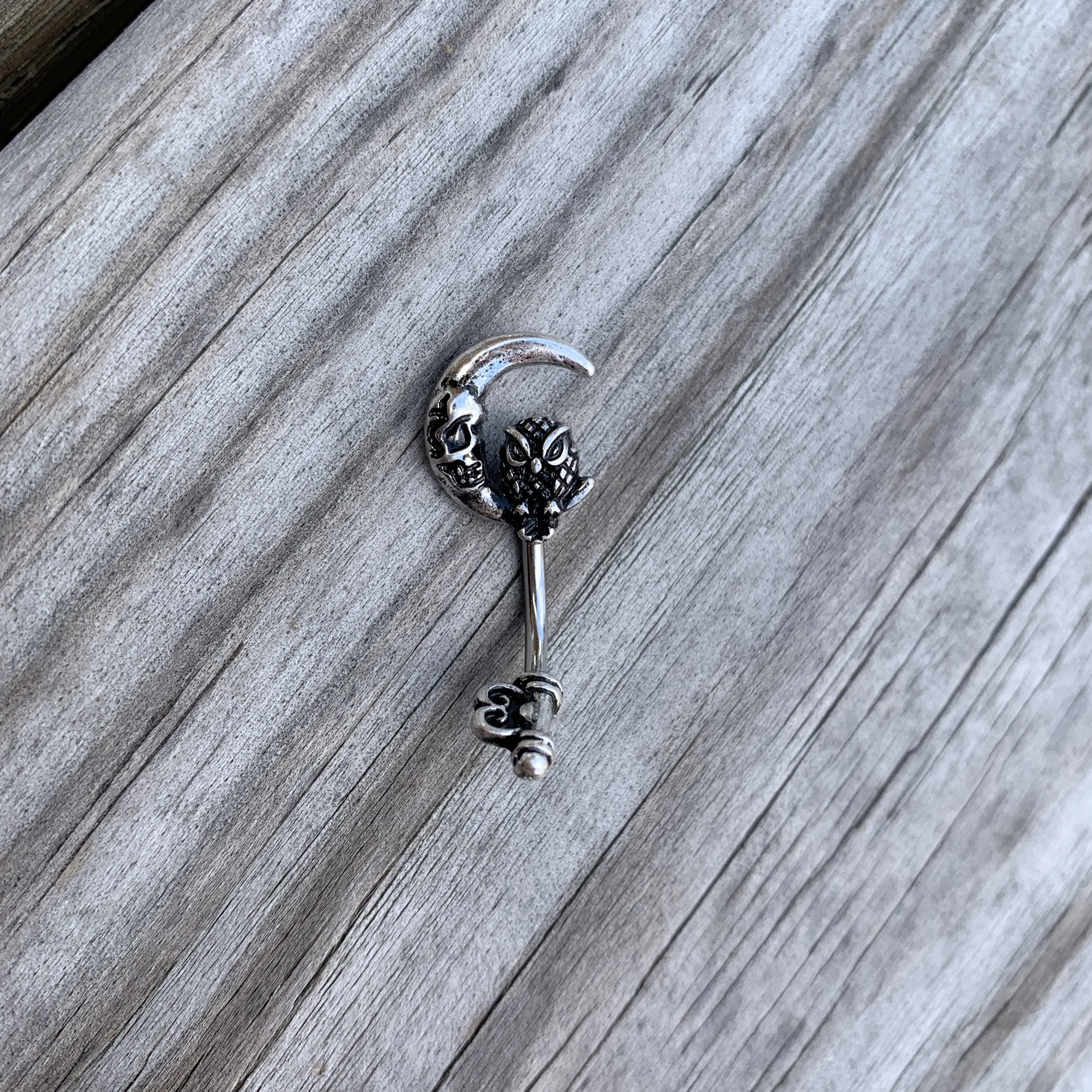 BodyCandy Owl Skull Key Mystic Moon Double Mount Belly Ring — lifestyle context