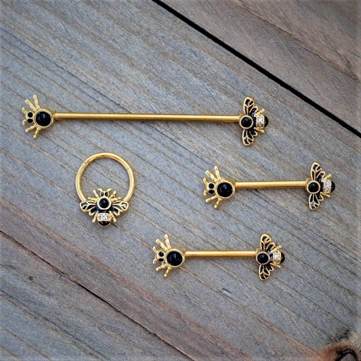 BodyCandy 14G Clear Black Gem Gold Tone Bug Out Bee Insect Industrial Barbell 38mm — detail close-up