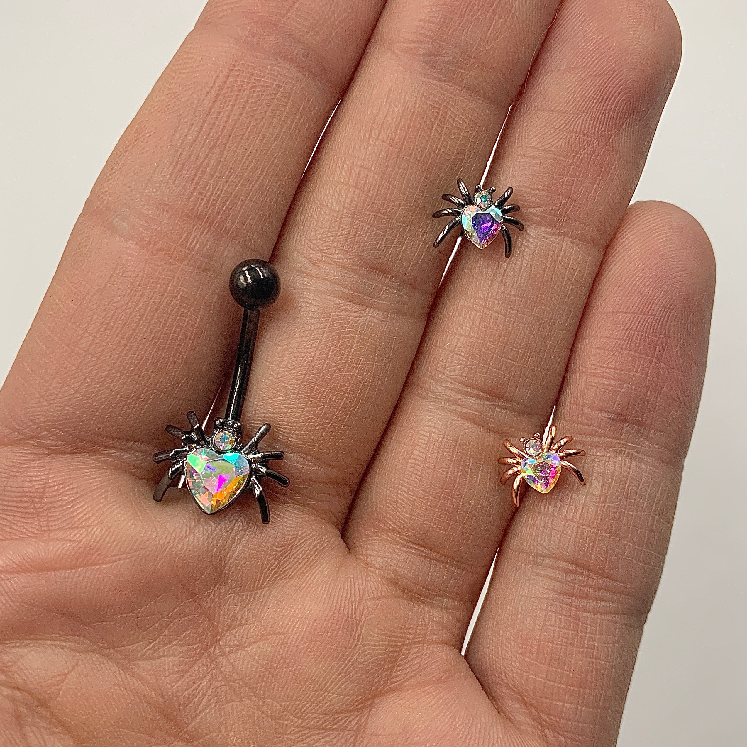 BodyCandy 16G 1/4 Aurora Gem Rose Gold Tone Heart Spider Cartilage Tragus — lifestyle context