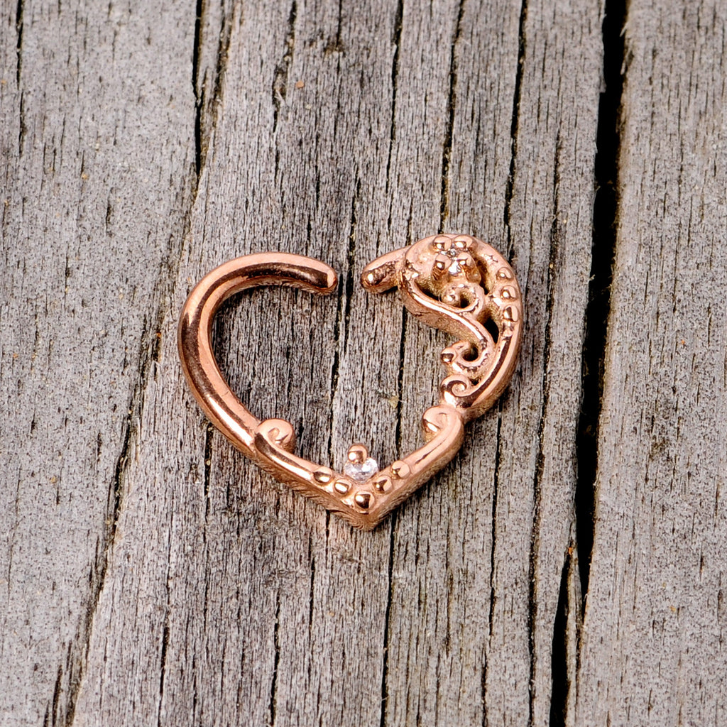 BodyCandy 16G 3/8 Clear CZ Gem Rose Gold Tone Heart Left Ear Closure Ring — lifestyle context