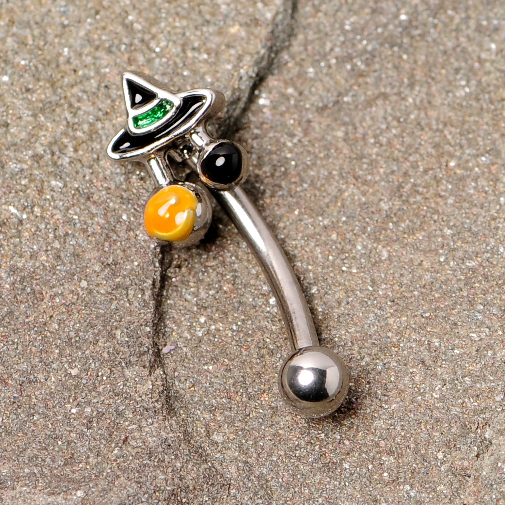 BodyCandy 16G 5/16 Black Green Witches Hat Halloween Curved Eyebrow Ring — detail close-up