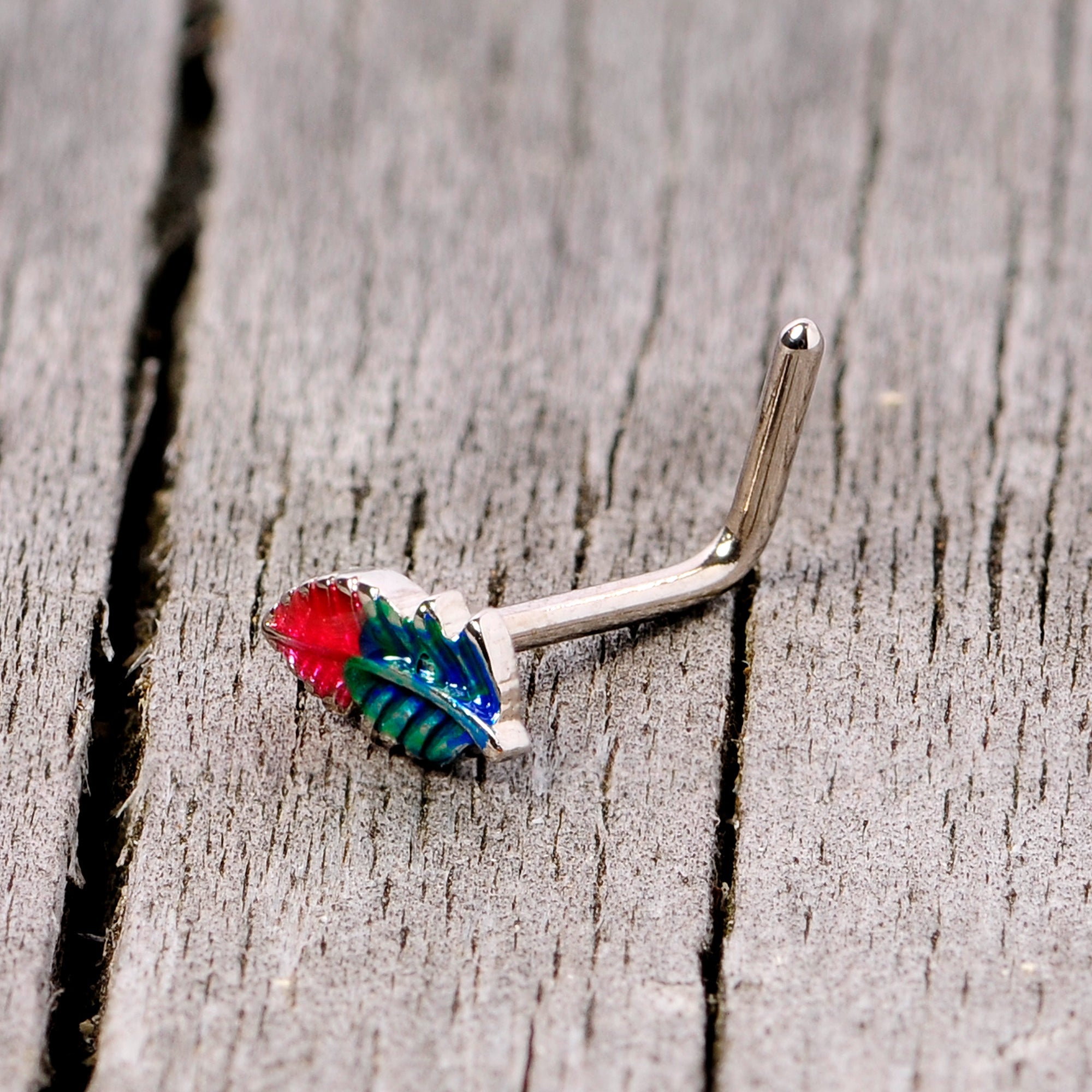 BodyCandy 20G 1/4 Blue Green Red Feather L Shaped Nose Ring — in-use photo