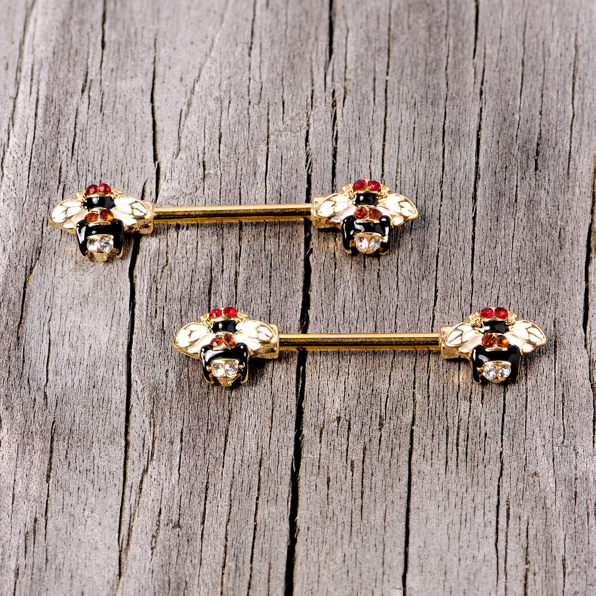 BodyCandy 14G 9/16 Clear Yellow Gem Gold Tone Bee Barbell Nipple Ring Set — lifestyle context