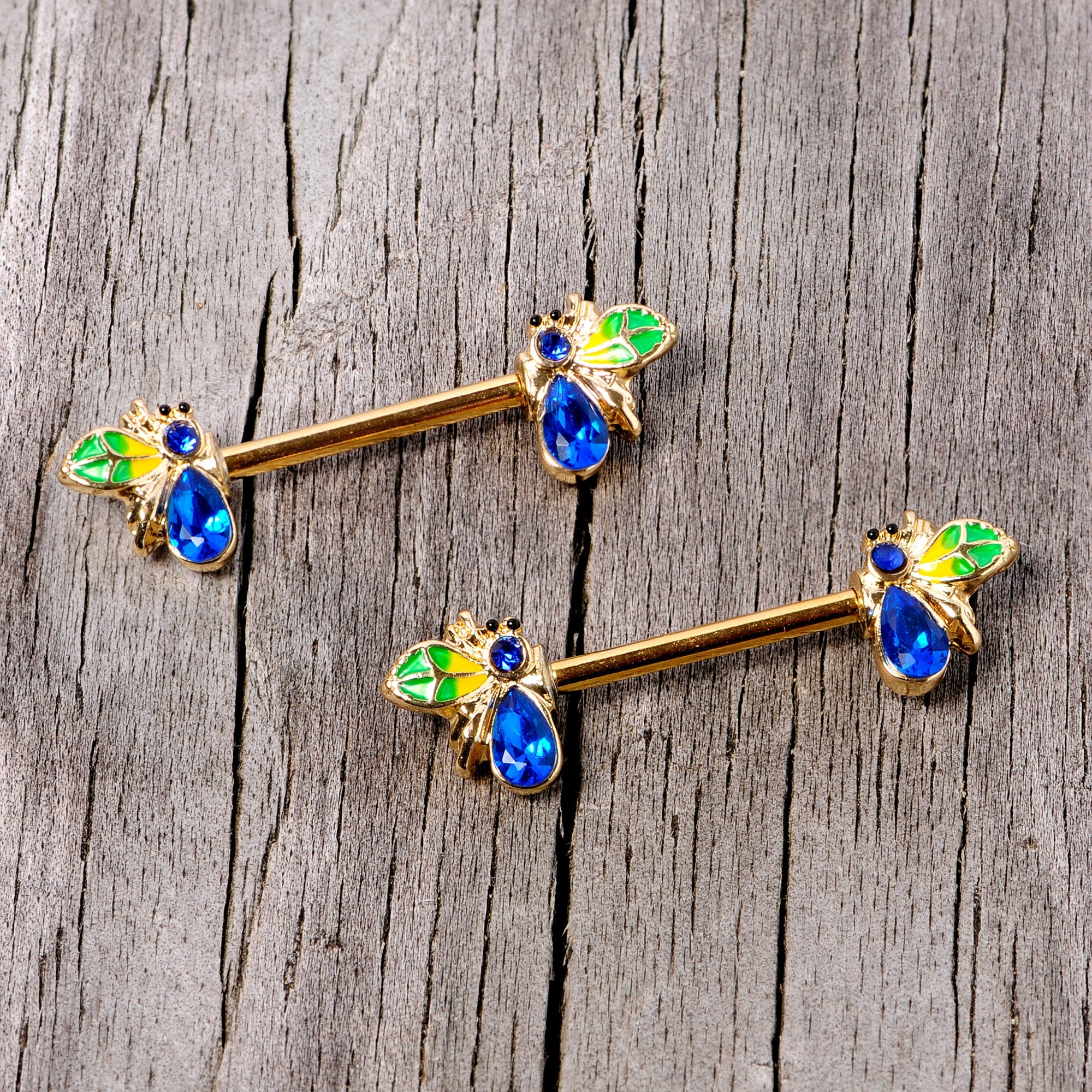 BodyCandy 14G 9/16 Blue Gem Gold Tone Colorful Bee Barbell Nipple Ring Set — lifestyle context