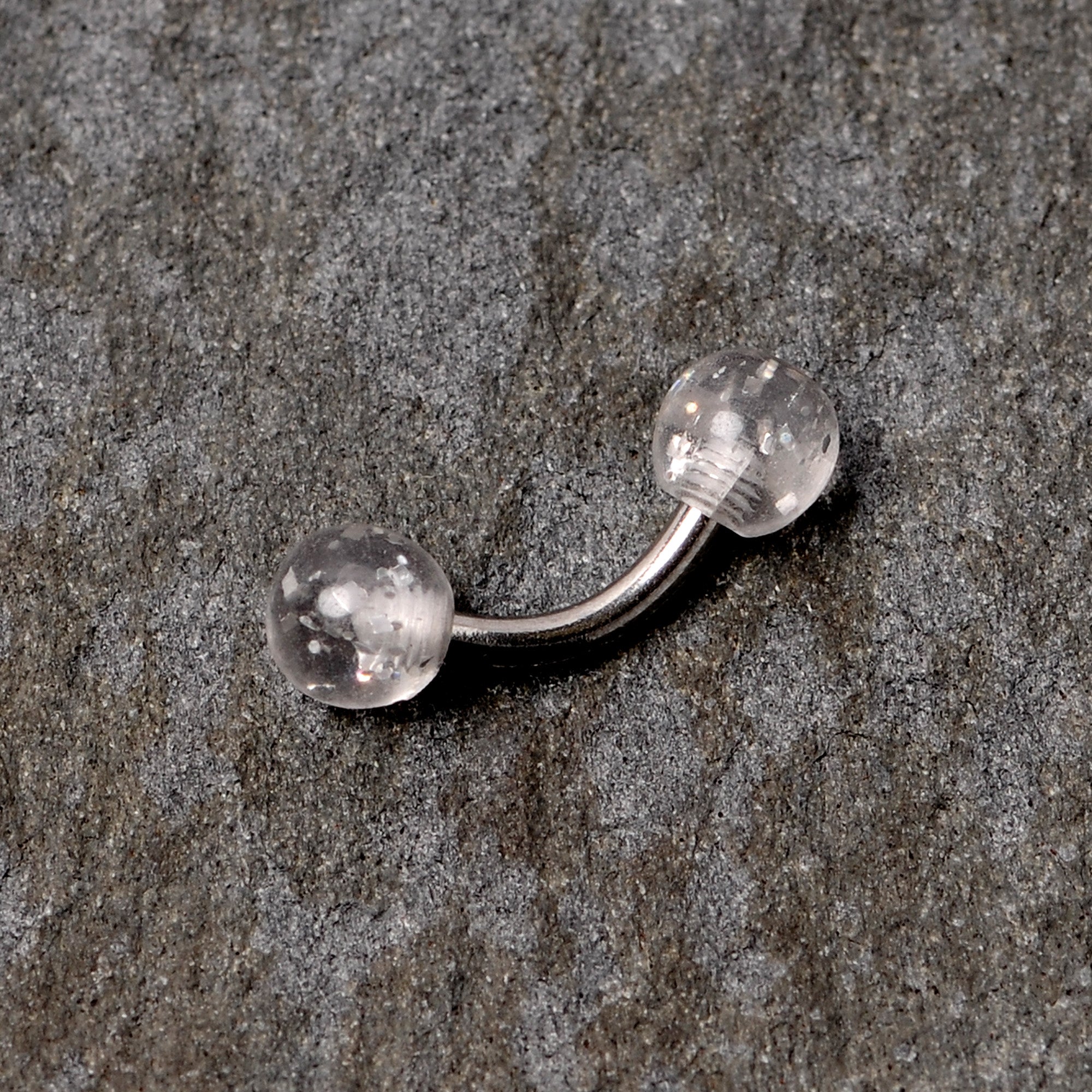 BodyCandy 16G 1/4 Clear Speckled Acrylic Ends Curved Barbell — lifestyle context