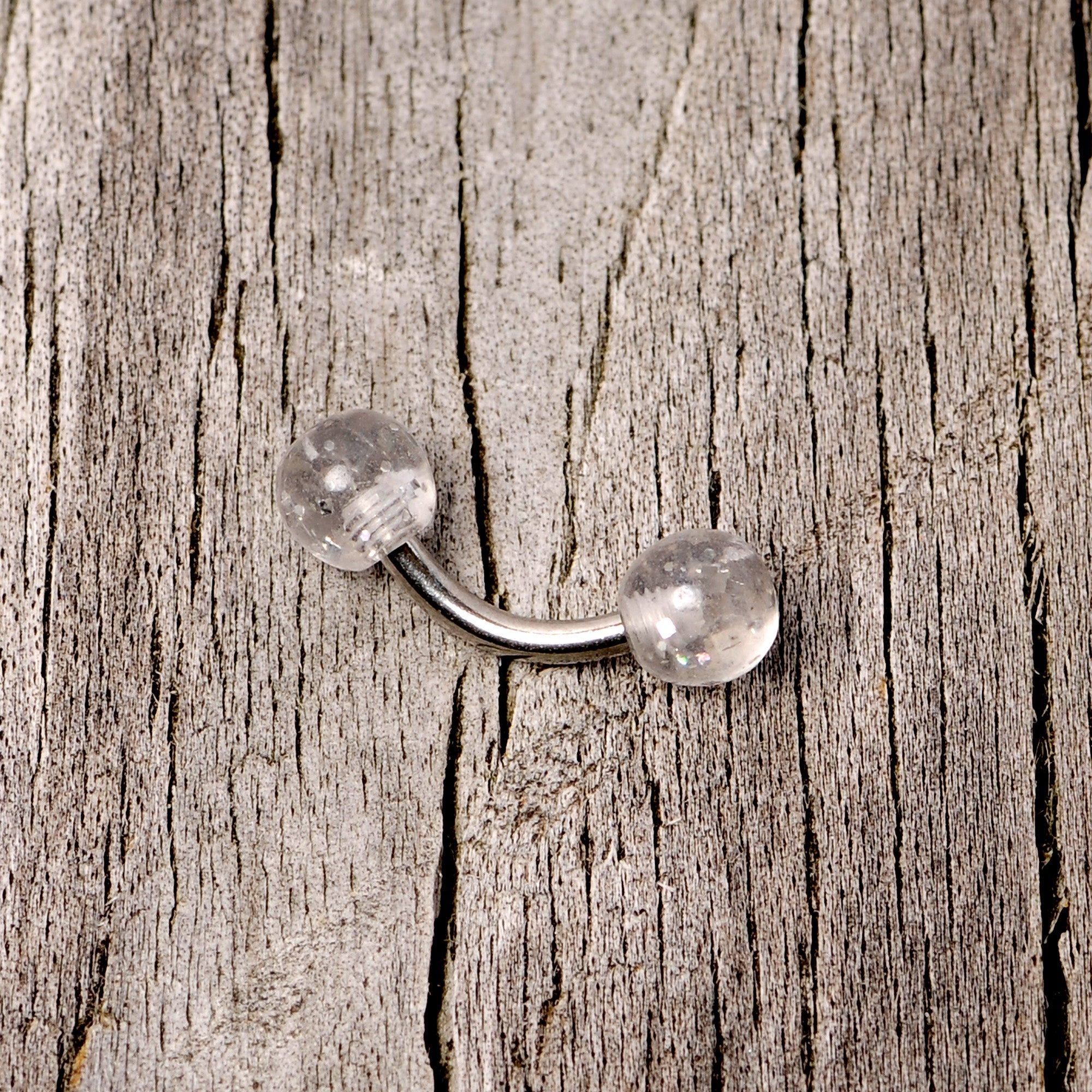 BodyCandy 16G 1/4 Clear Speckled Acrylic Ends Curved Barbell — back view