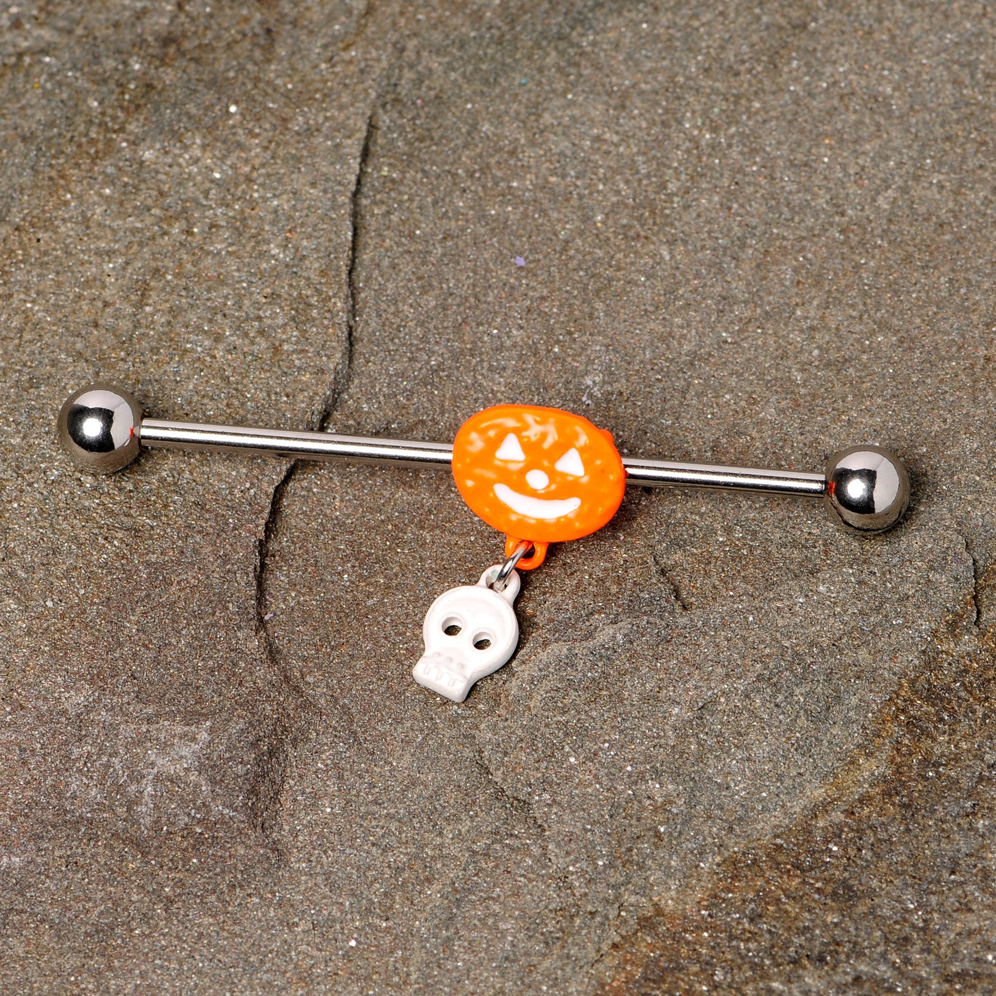BodyCandy 14G Pumpkin Skull Halloween Dangle Industrial Barbell 38mm — detail close-up