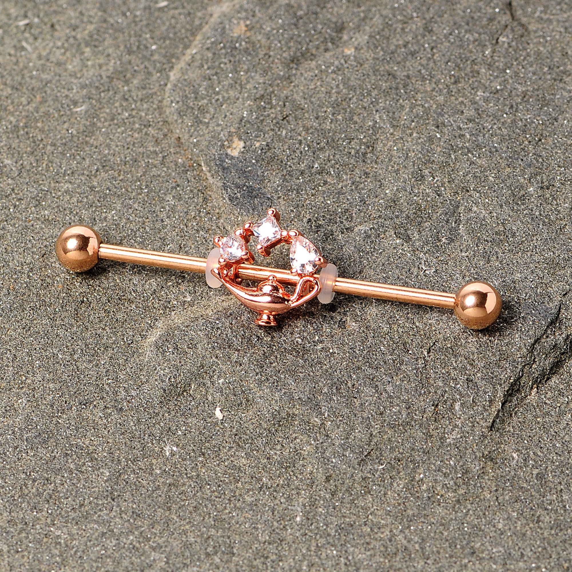 BodyCandy 14G Clear CZ Gem Rose Gold Hue Genie Lamp Industrial Barbell 38mm — lifestyle context