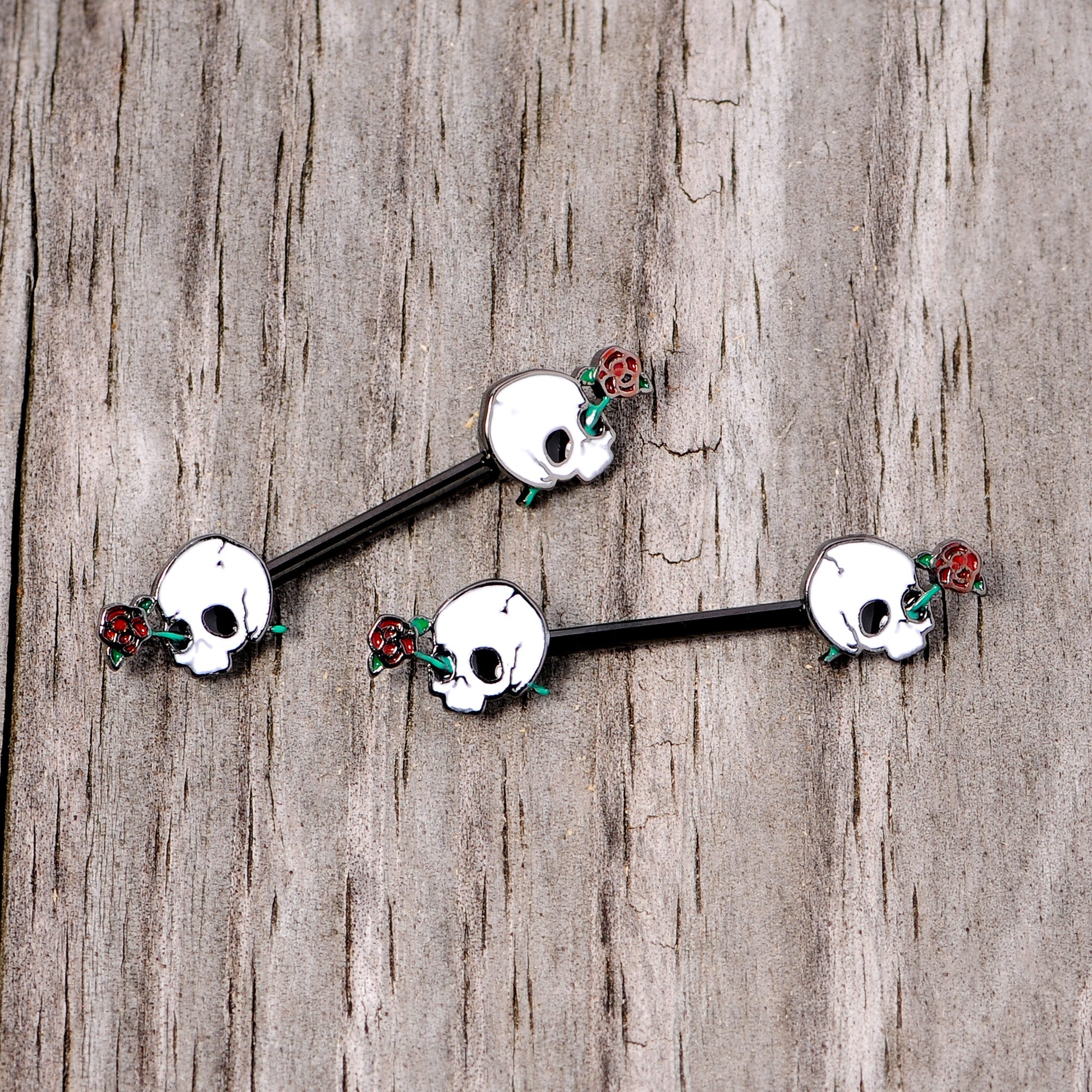 BodyCandy 14G 9/16 Black PVD Rose Scary Skull Halloween Nipple Ring Set — lifestyle context