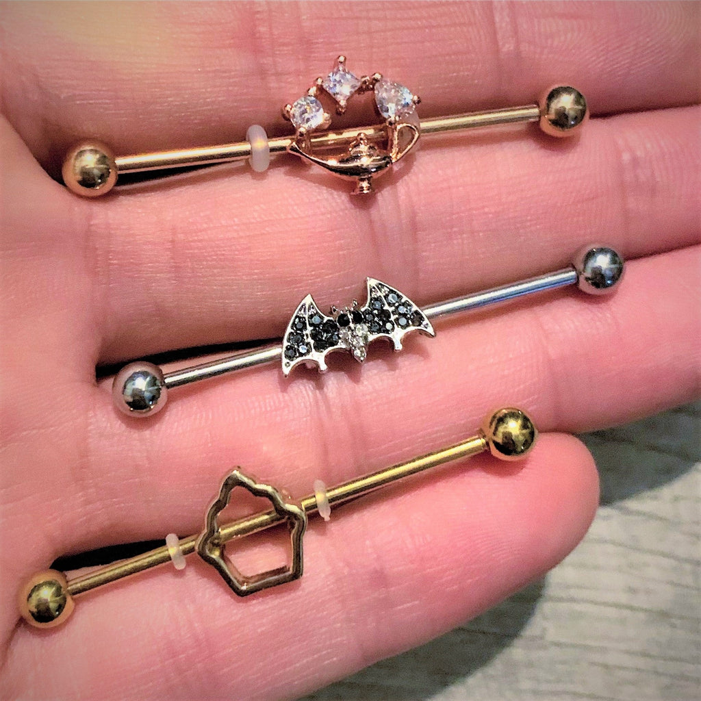 BodyCandy 14G Clear CZ Gem Rose Gold Hue Genie Lamp Industrial Barbell 38mm — detail close-up