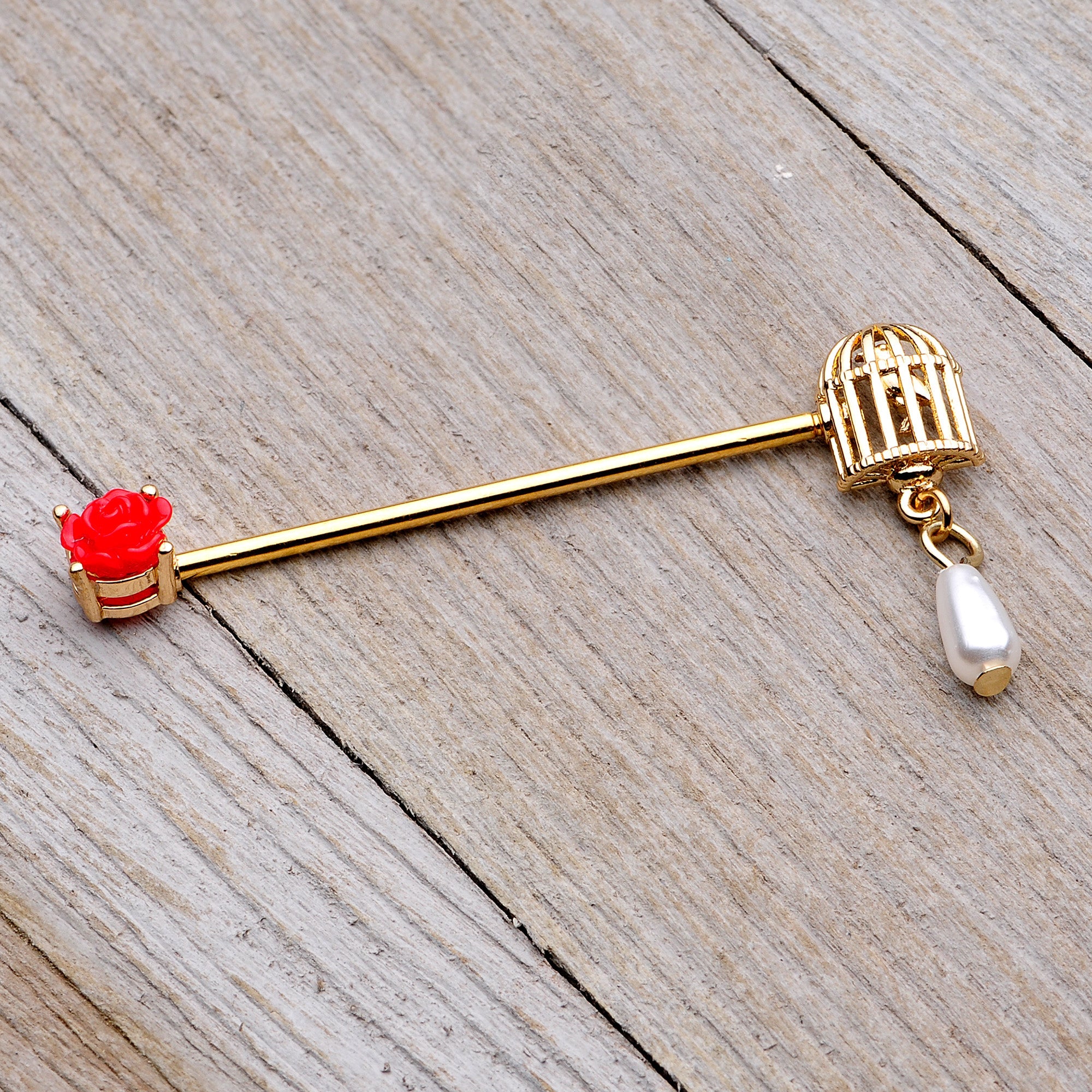BodyCandy 14G Gold Tone Red Flower Birdcage Industrial Barbell 38mm — side view