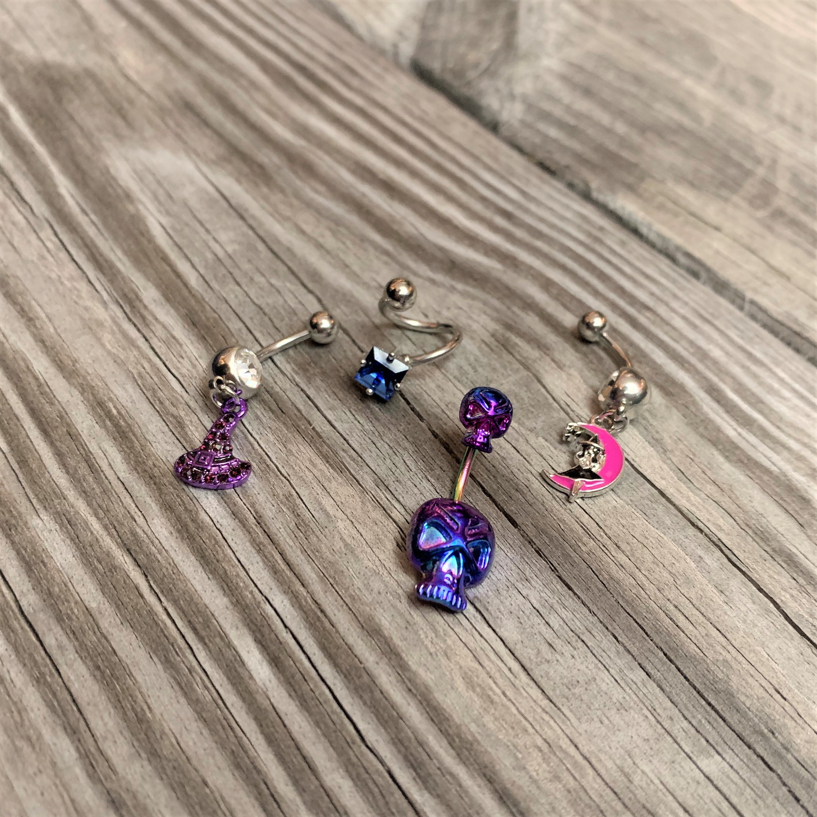 BodyCandy Rainbow Scary Double Skull Halloween Double Mount Belly Ring — side view