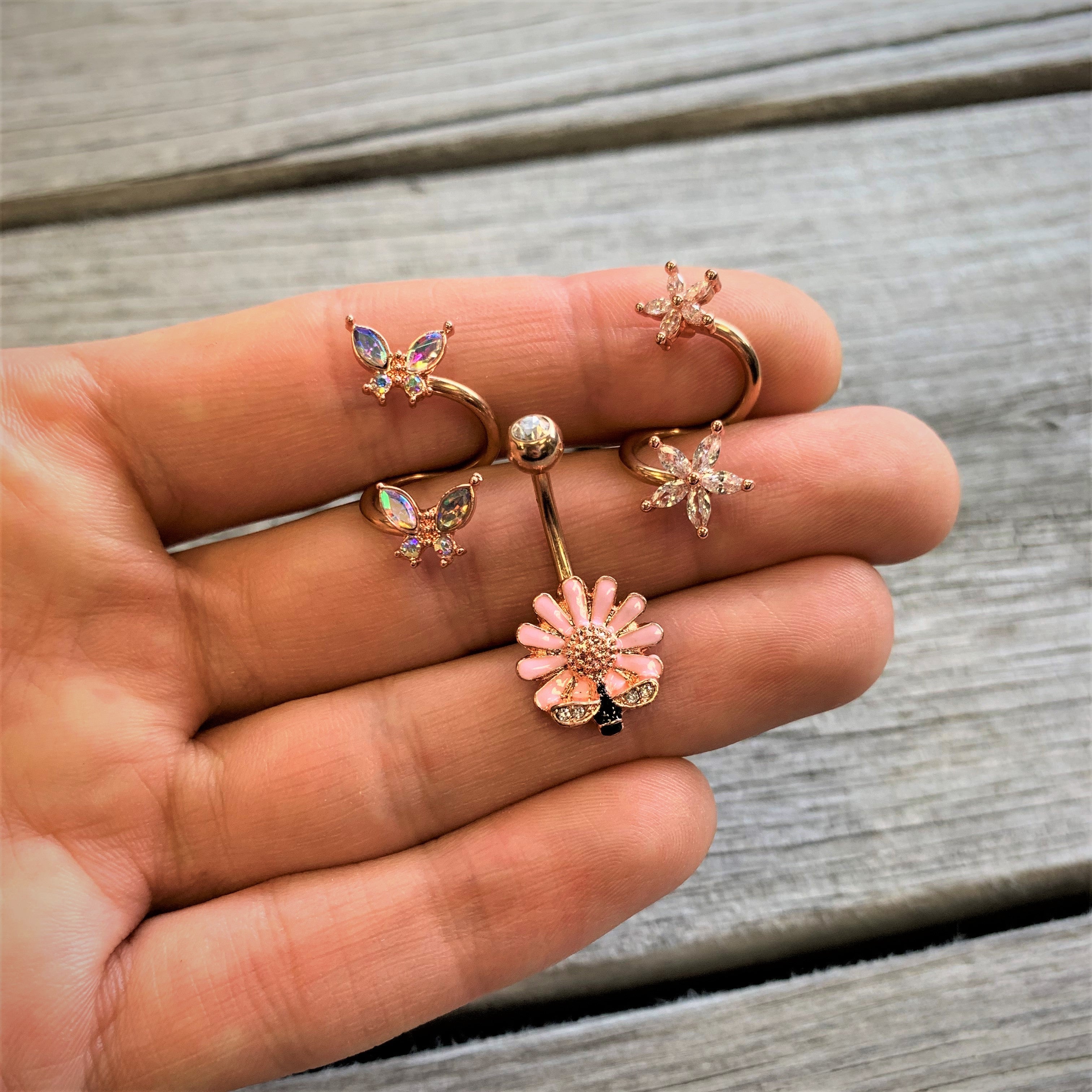 BodyCandy 14G 3/8 Aurora Gem Rose Gold Tone Butterfly Spiral Twister Ring — detail close-up