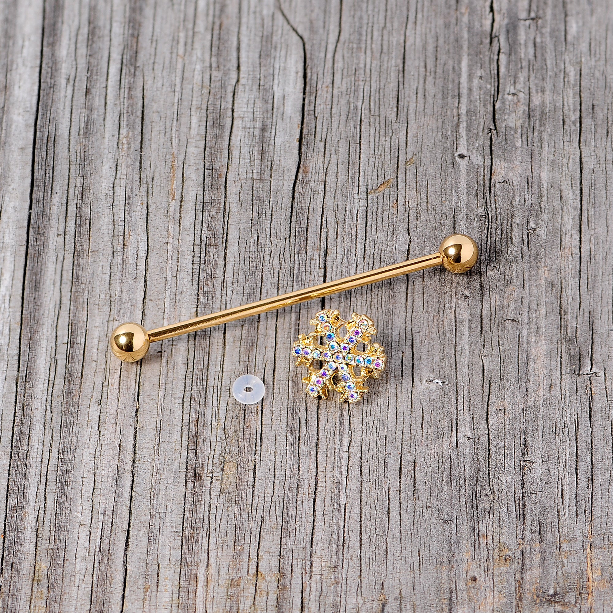 BodyCandy 14G Aurora Gem Gold Tone Snowflake Industrial Barbell 38mm — in-use photo