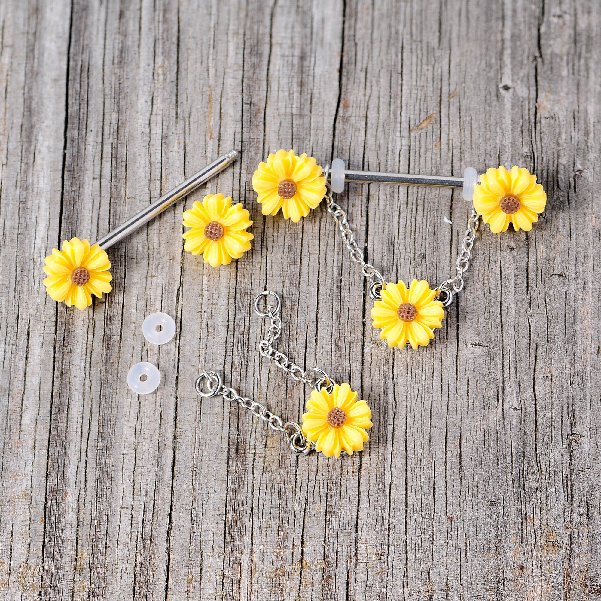 BodyCandy 14G 5/8 Yellow Sunflowers Dangle Nipple Ring Set — side view