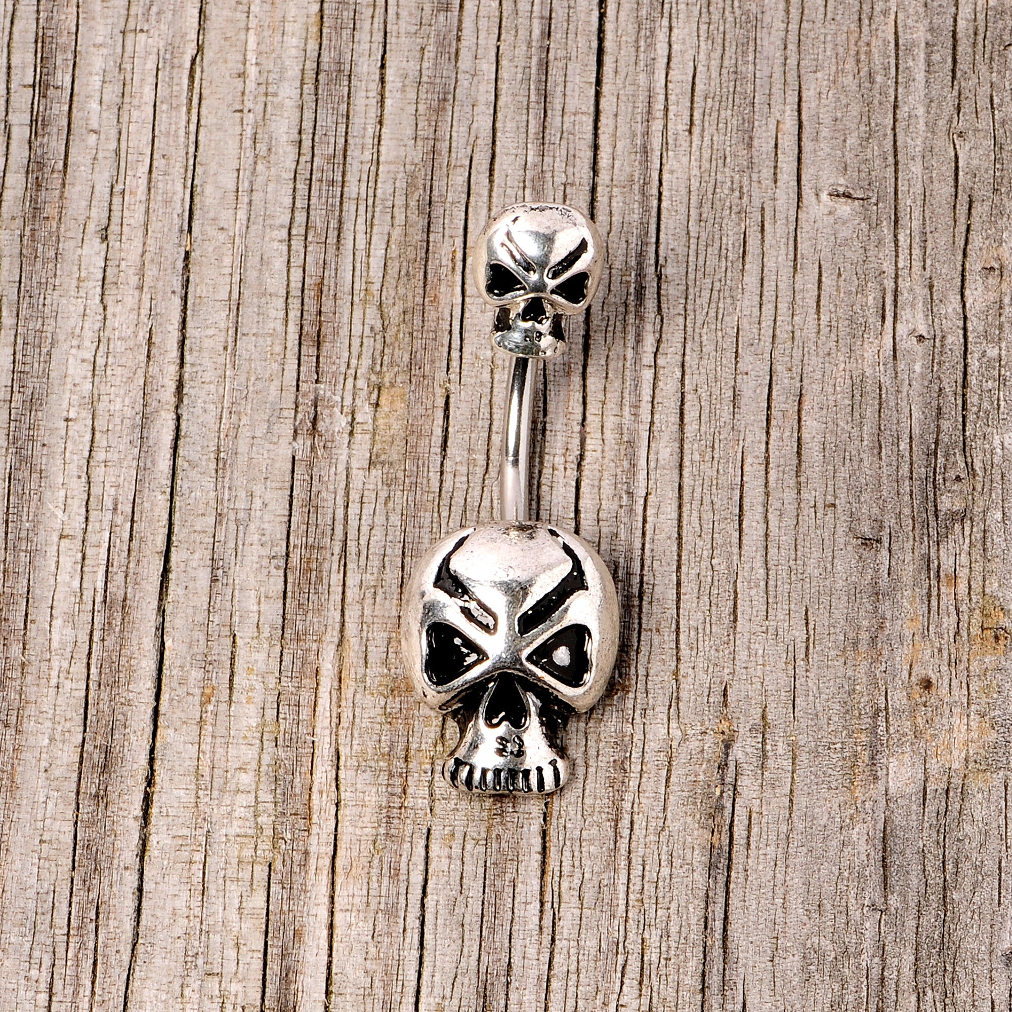 BodyCandy Scary Double Skull Halloween Double Mount Belly Ring — side view