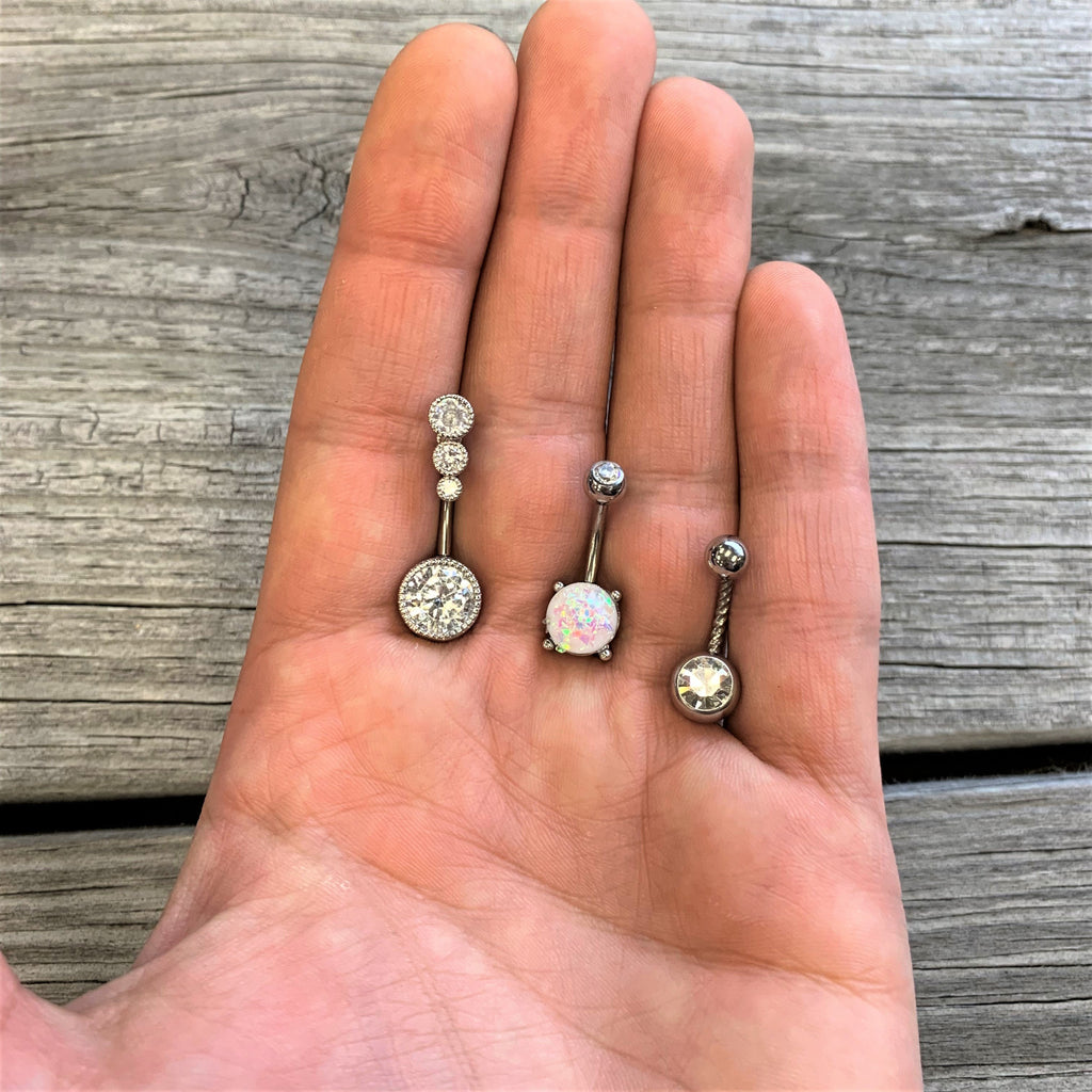 BodyCandy Clear Gem White Faux Opal Twisted Belly Ring Set of 3 — detail close-up