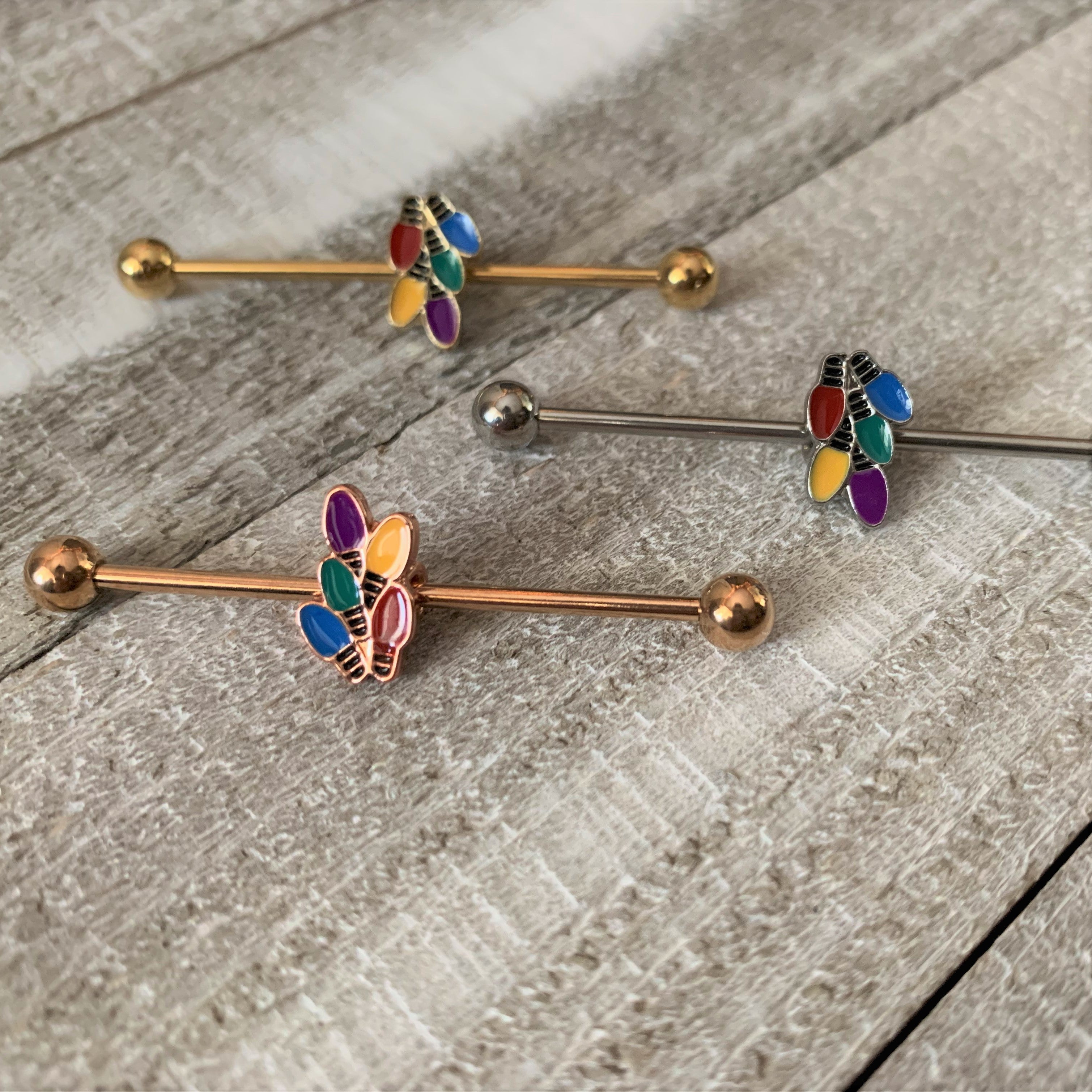 BodyCandy 14G Rose Gold Tone Christmas Lights Industrial Barbell 38mm — lifestyle context