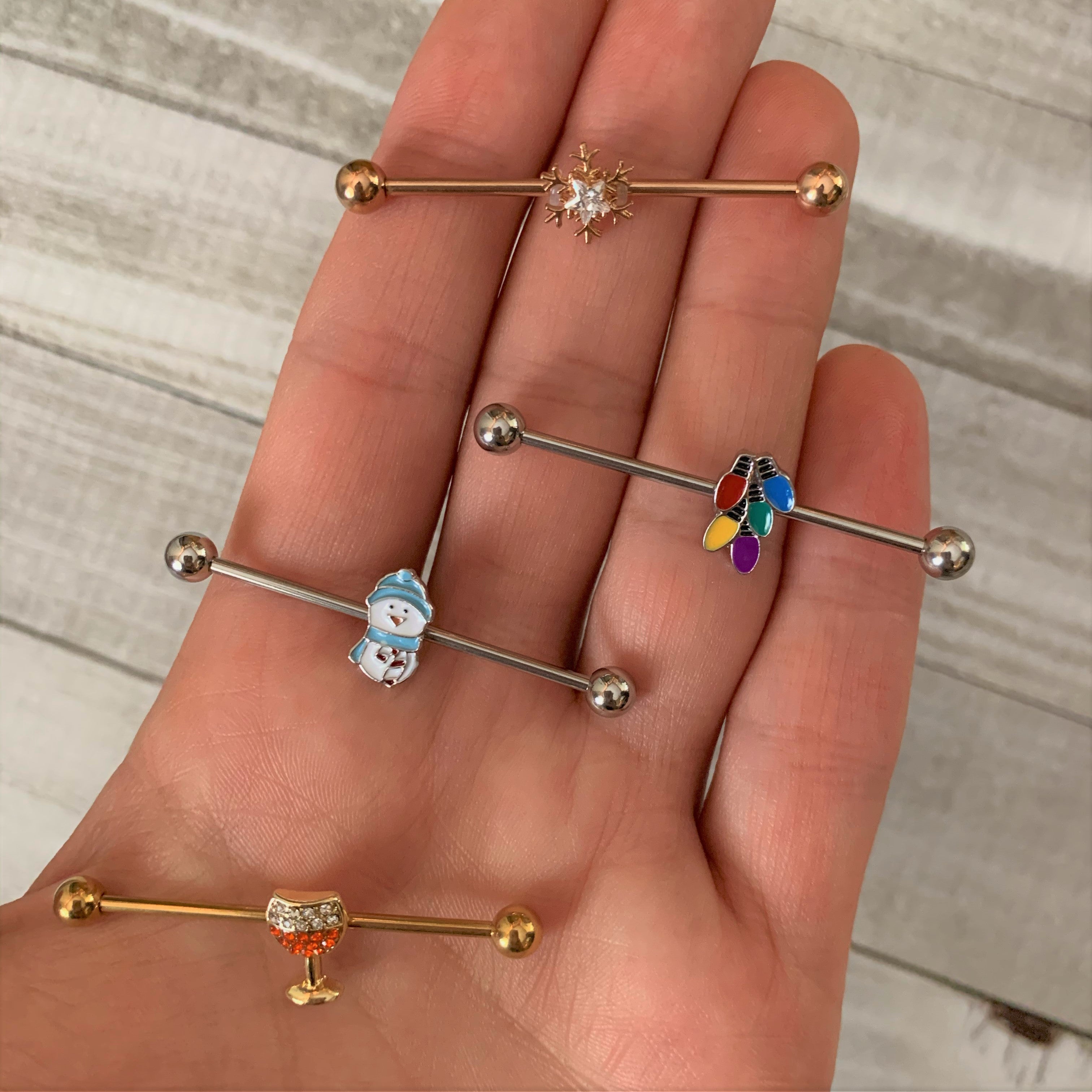 BodyCandy 14G Clear Gem Rose Gold Tone Snowflake Industrial Barbell 38mm — detail close-up