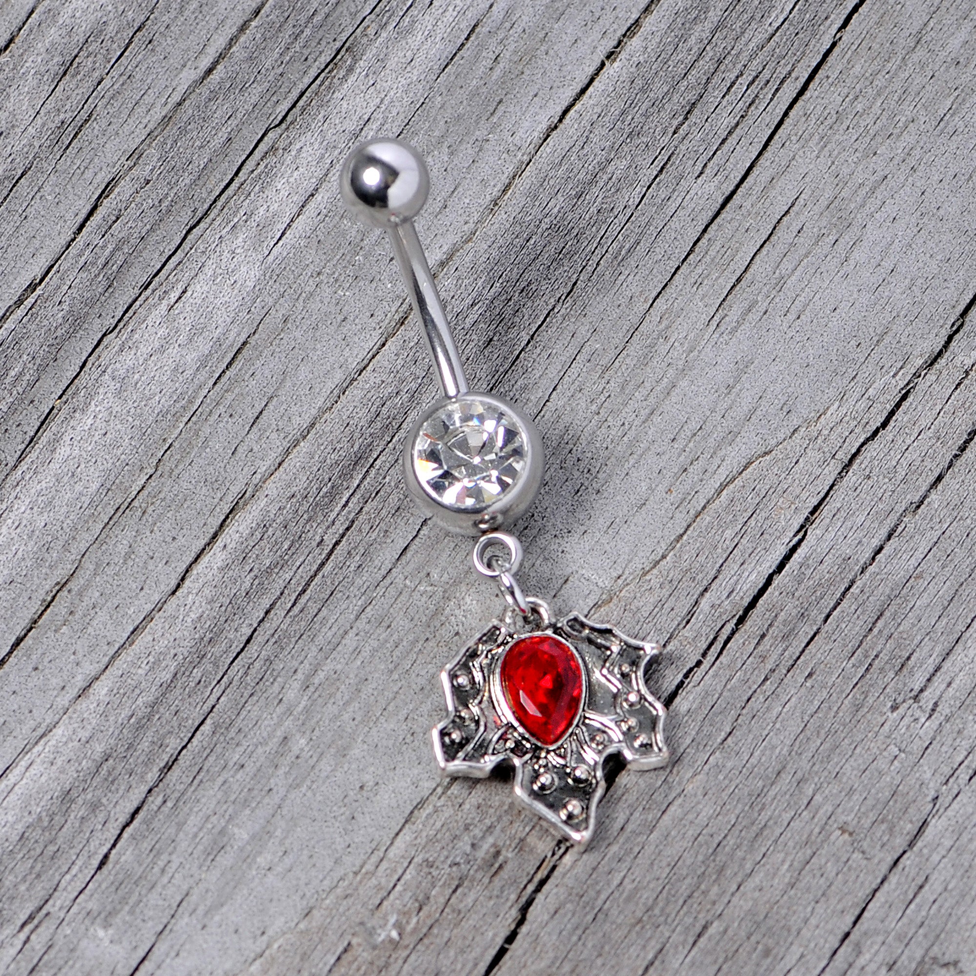 BodyCandy Clear Red Gem Holiday Holly Leaf Christmas Dangle Belly Ring — side view