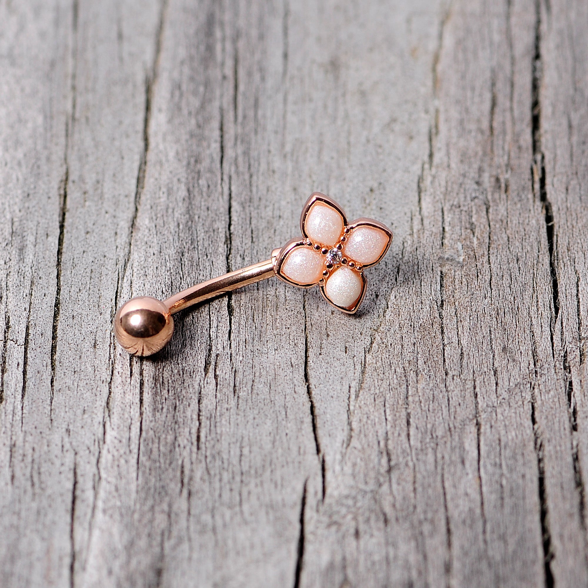 BodyCandy 16G 5/16 Clear Gem Rose Gold Tone Rhombus Curved Eyebrow Ring — side view
