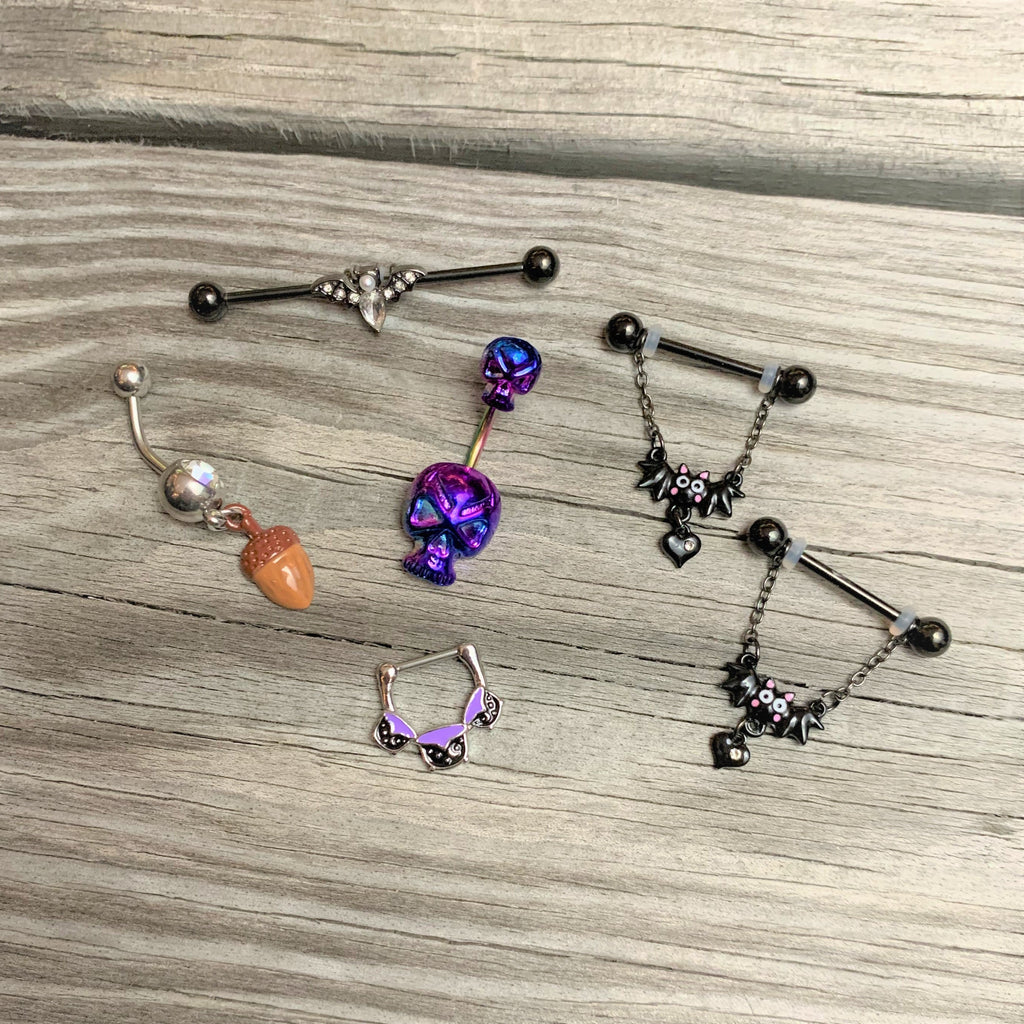 BodyCandy 16G 3/8 Black Purple Cauldron Halloween Cartilage Clicker — side view