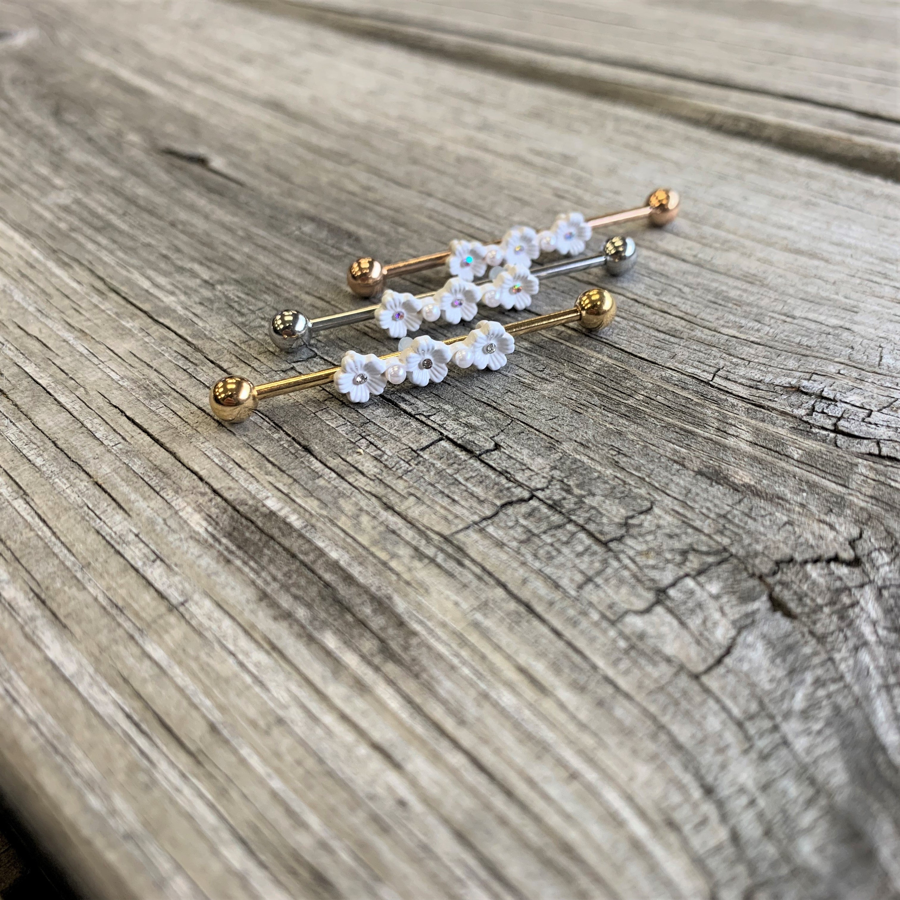 BodyCandy 14G Clear Gem White Flower Industrial Barbell 38mm — lifestyle context