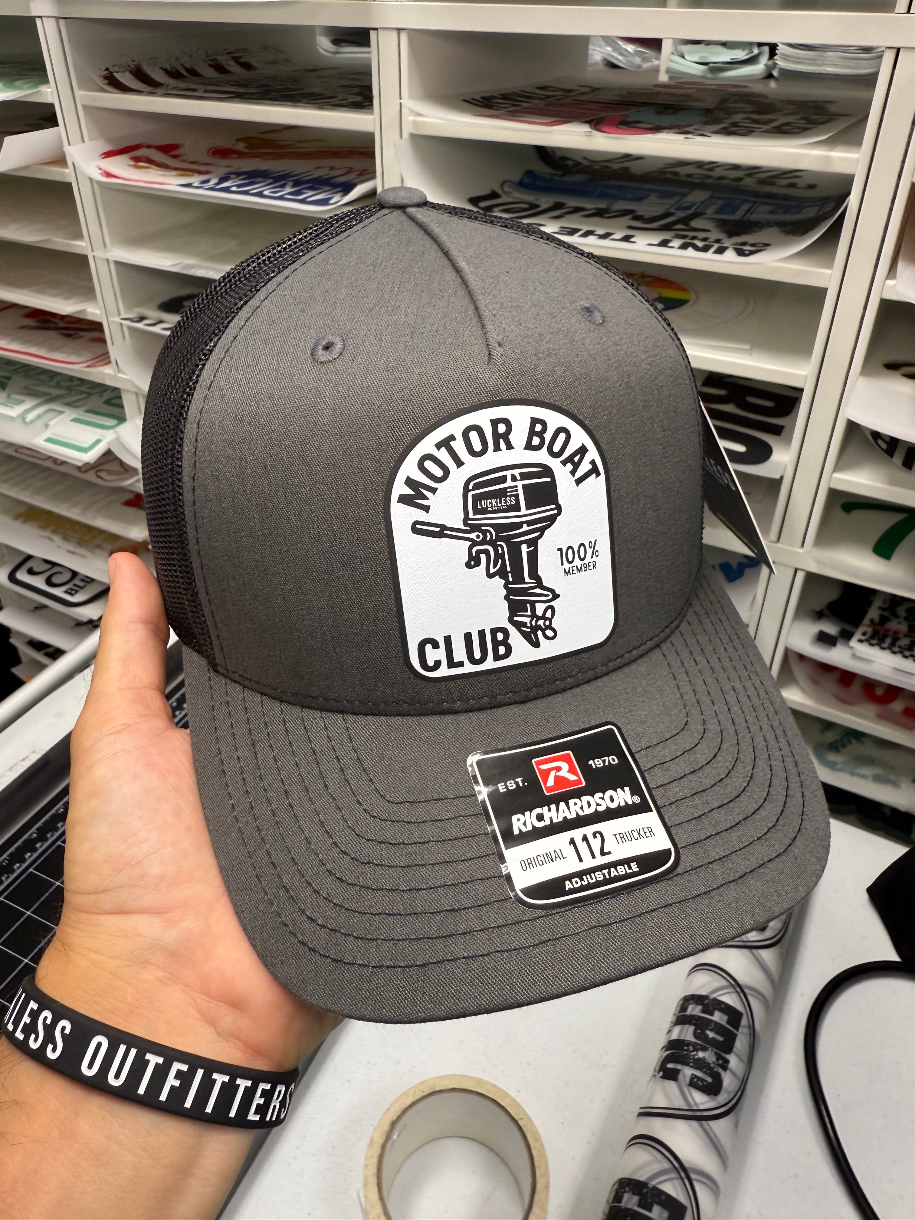 Luckless Outfitters Motor Boat Club Trucker Hat — detail close-up