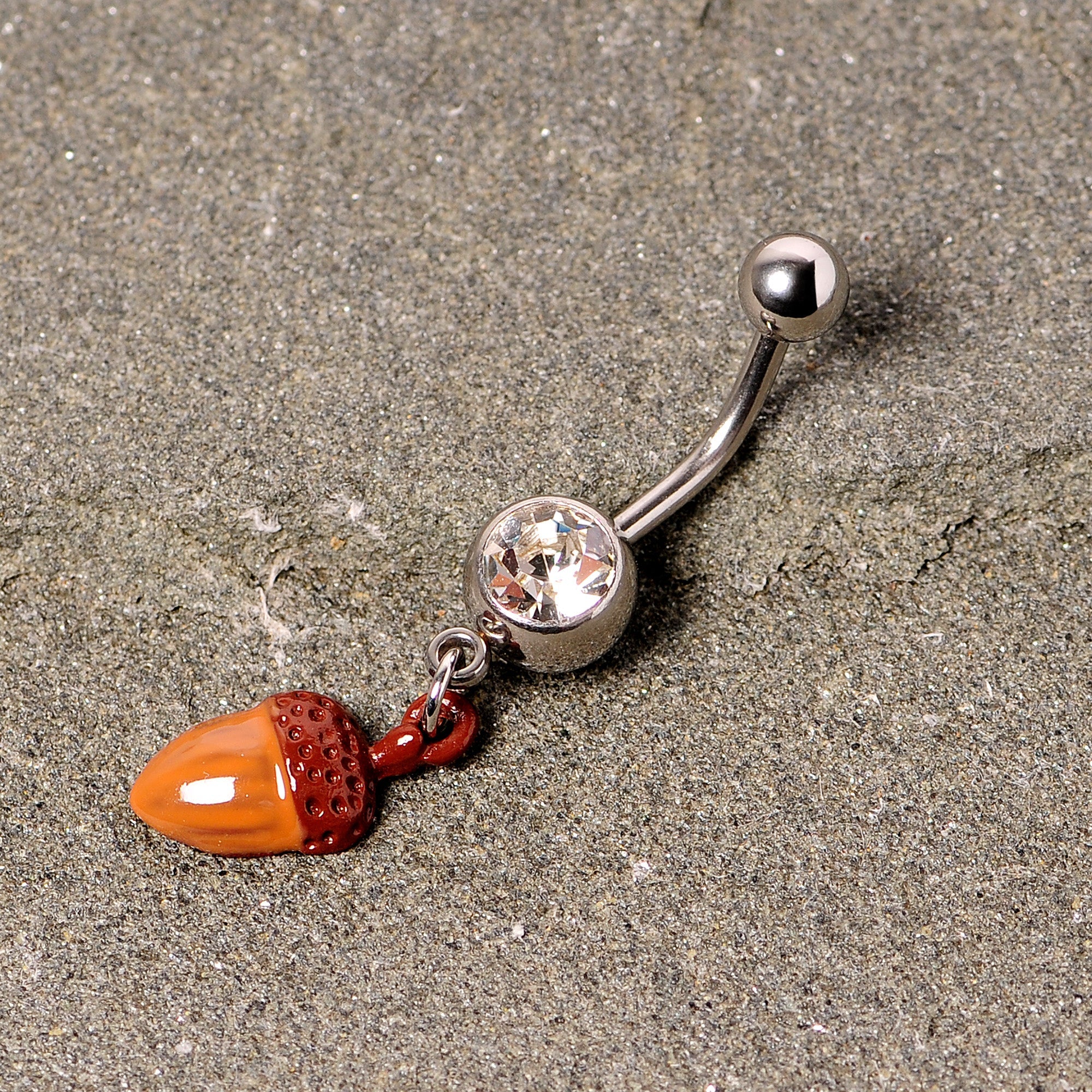 BodyCandy Clear Gem Brown Autumn Acorn Dangle Belly Ring — lifestyle context