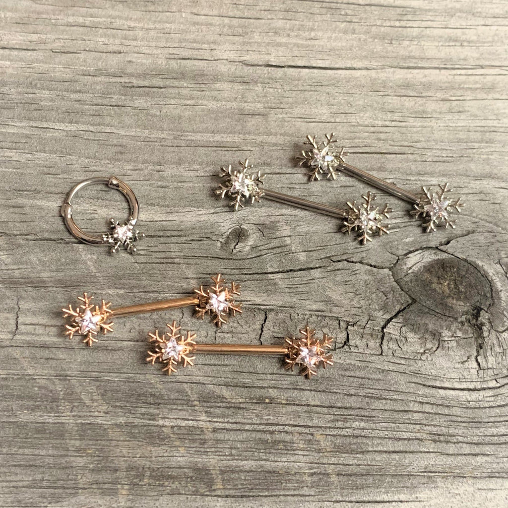 BodyCandy 16G 3/8 Clear Gem Holiday Snowflake Septum Clicker — side view