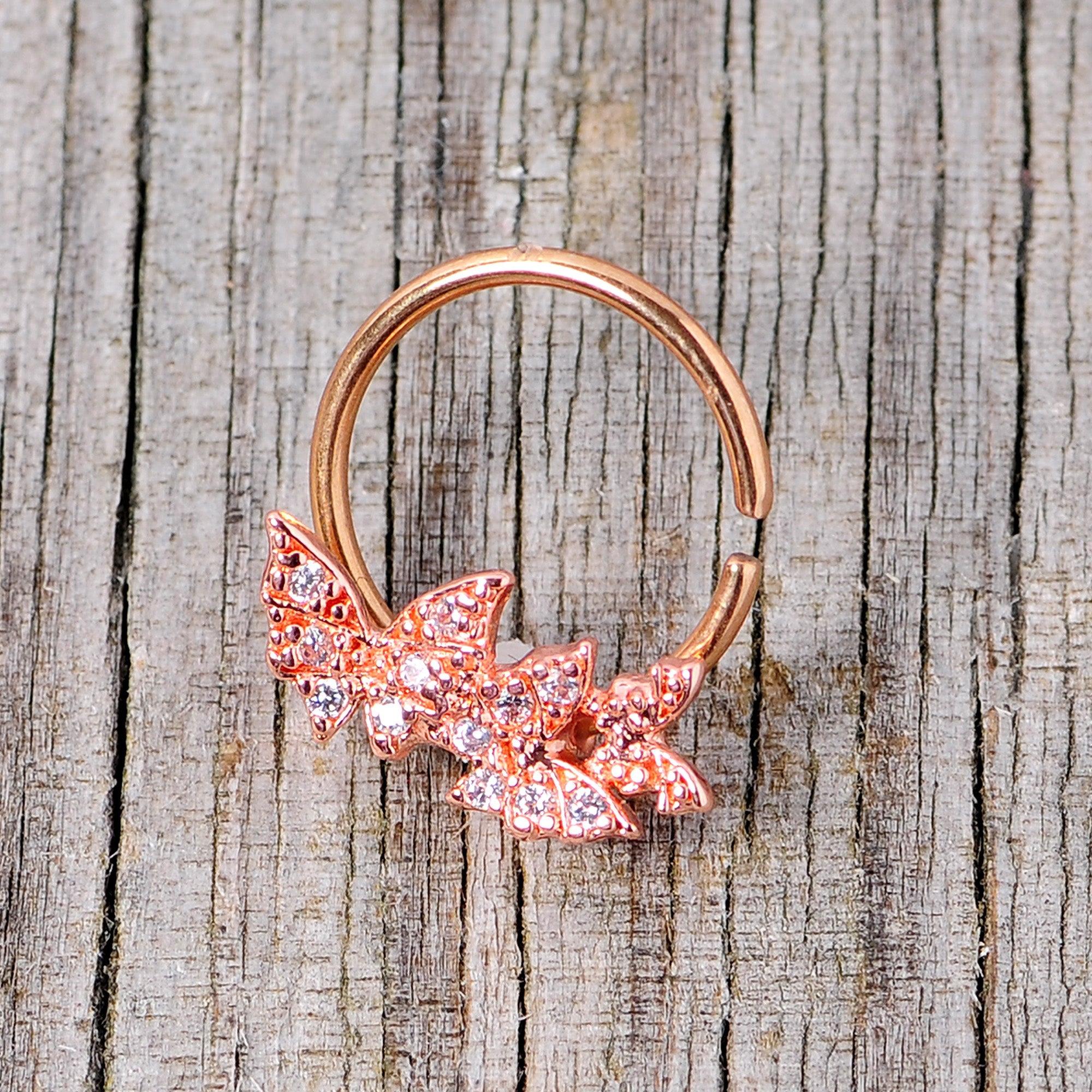 BodyCandy 16G 3/8 Clear CZ Gem Rose Gold Tone Trio Butterfly Seamless Ring — lifestyle context