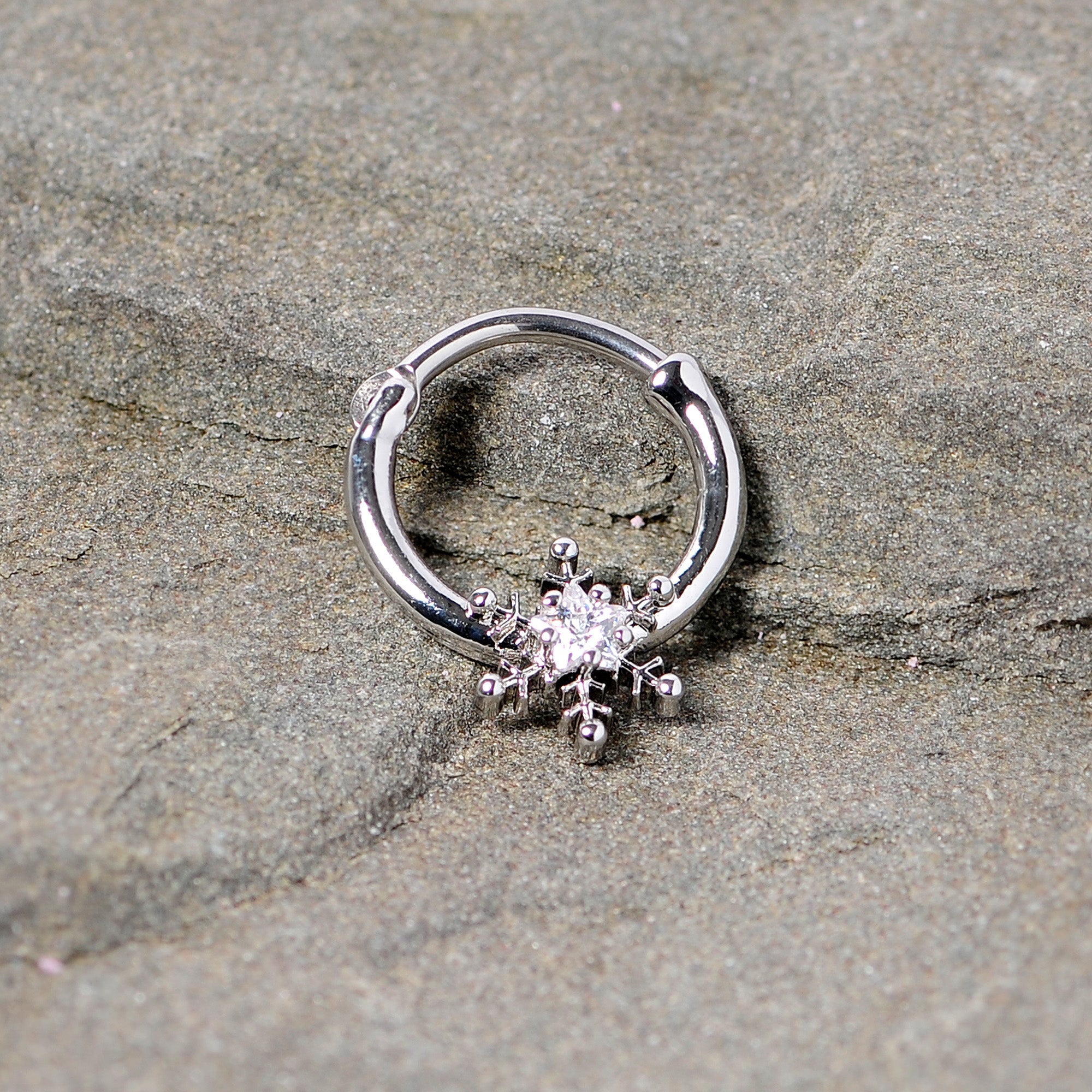 BodyCandy 16G 3/8 Clear Gem Holiday Snowflake Septum Clicker — in-use photo
