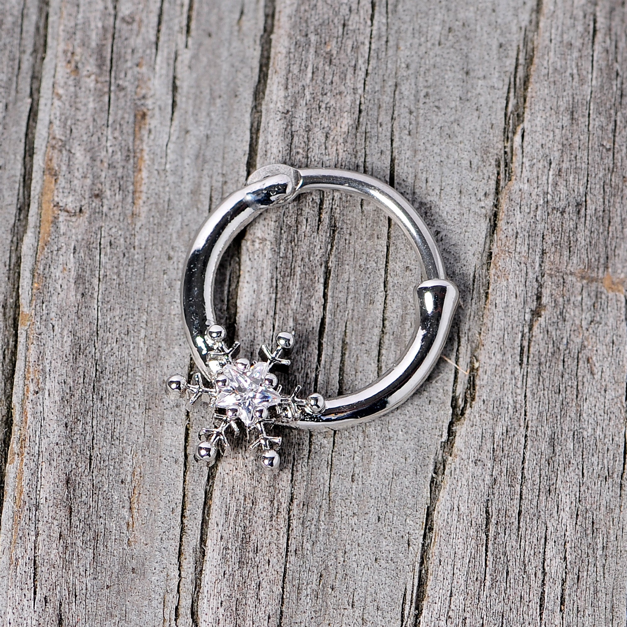 BodyCandy 16G 3/8 Clear Gem Holiday Snowflake Septum Clicker — size reference