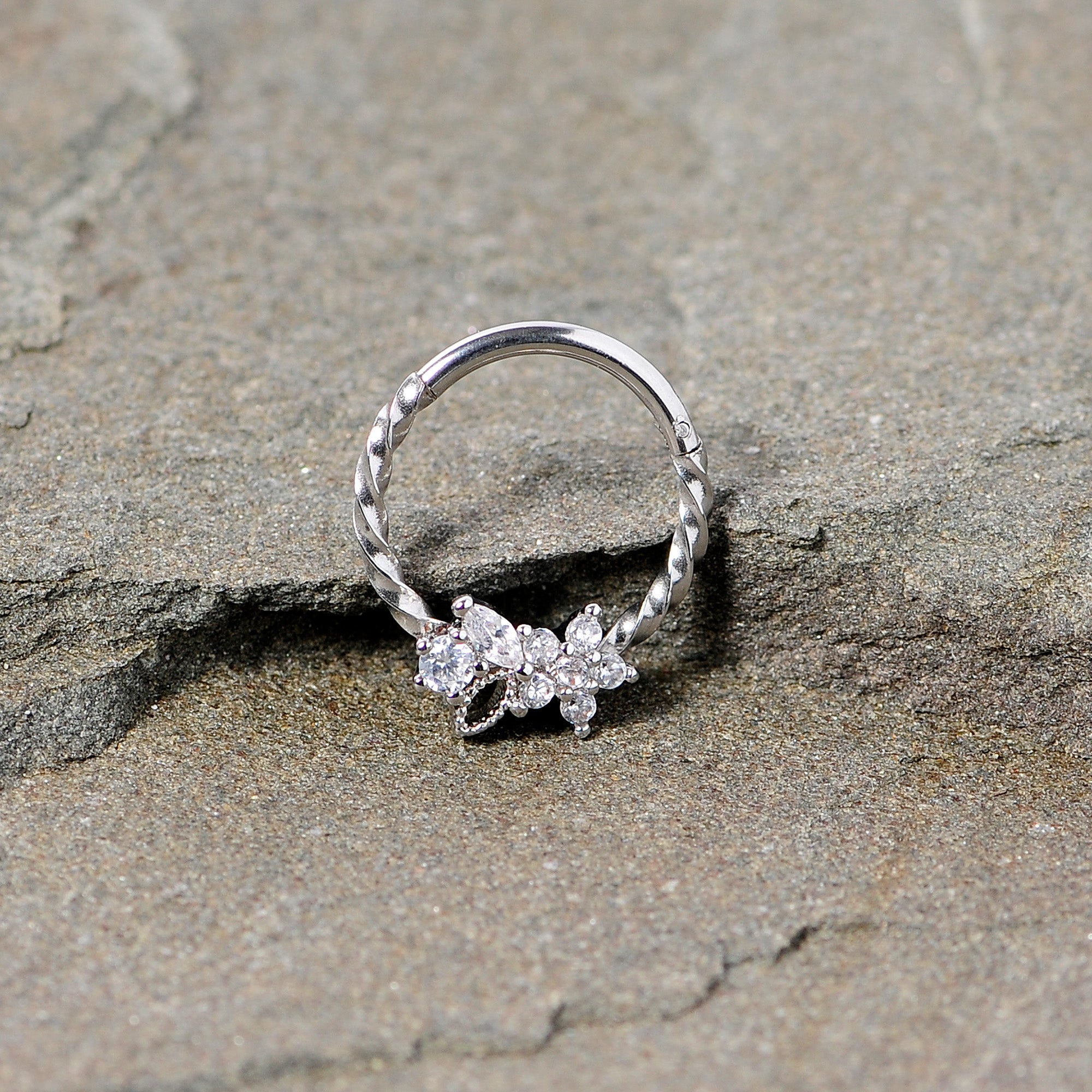 BodyCandy 16G 3/8 Clear Gem Star Twisted Hinged Segment Ring — lifestyle context